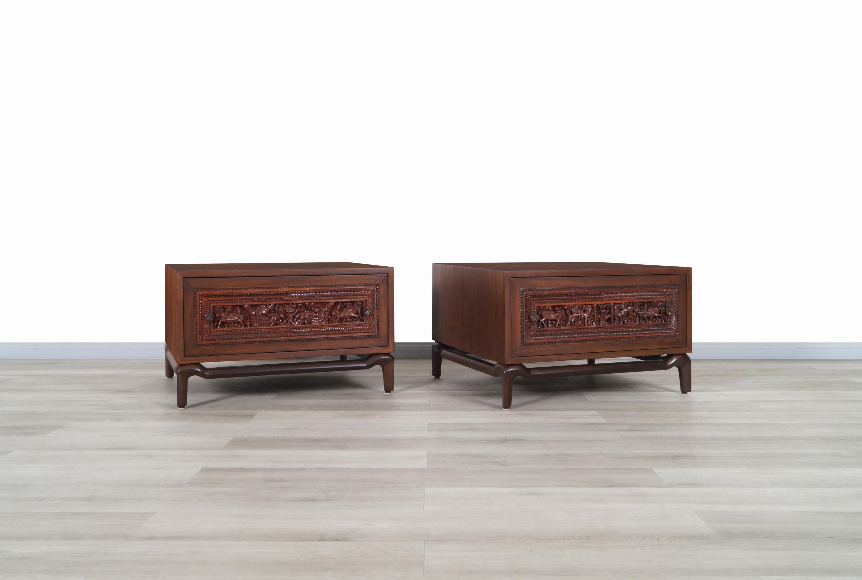Gorgeous vintage walnut nightstands designed by Maurice Bailey for Monteverdi Young in United States, circa 1960s. Fantastic pair of nightstands made of walnut that reveals its exquisite lines through the case. Each case sits on a sculptural base
