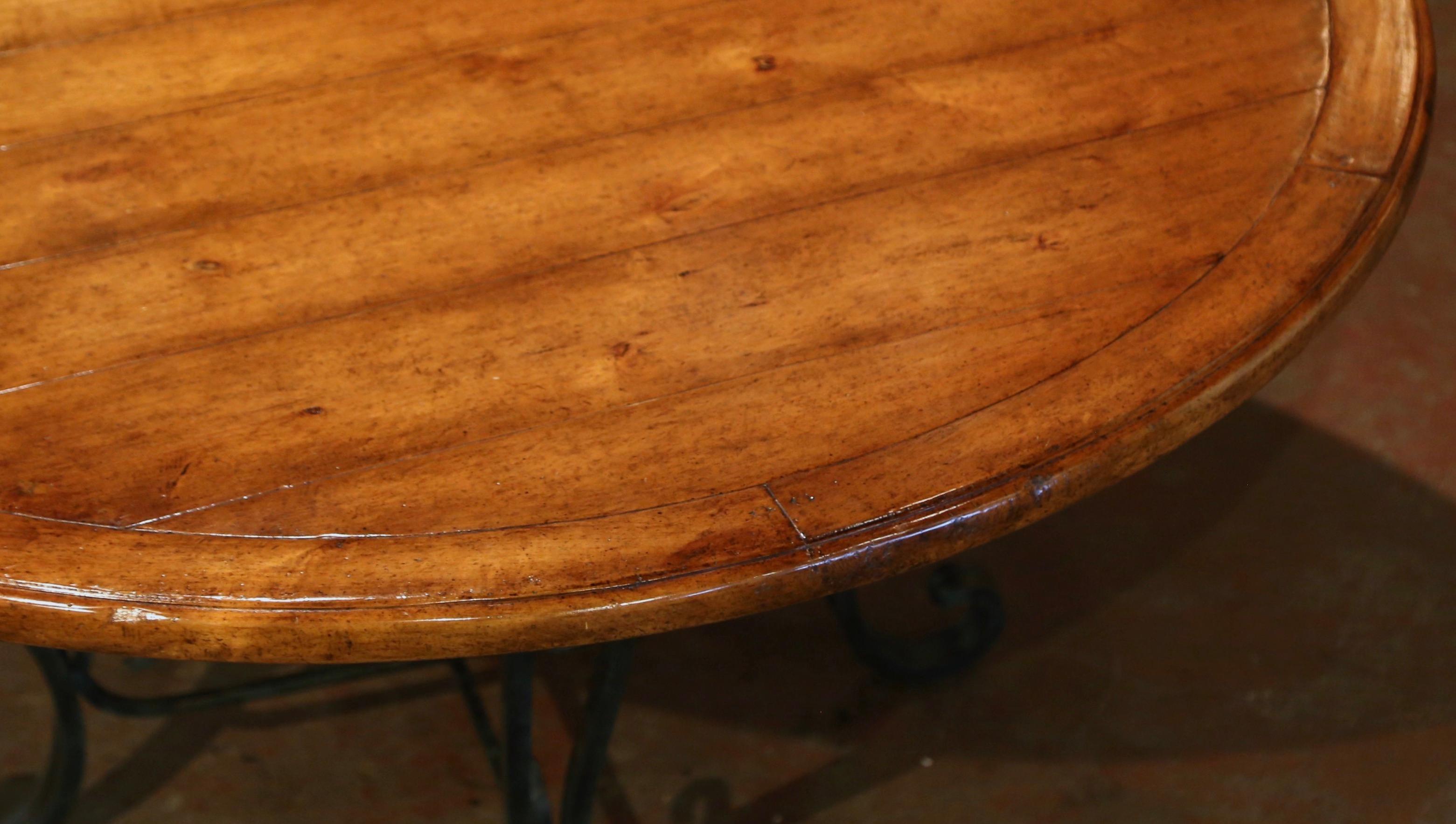 Vintage Walnut Round Dining Room Table on Four-Leg Wrought Iron Base In Excellent Condition In Dallas, TX