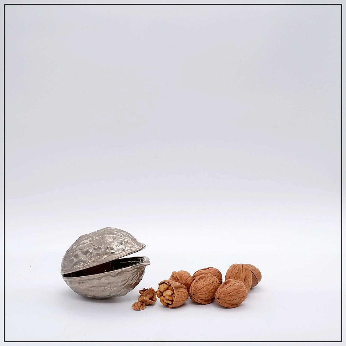 Vintage Walnut Shaped Nut Cracker, 1970's
Decorative Object - Vintage
Measures : 12.5cmx9cm H:7cm 
Wear consistent with age and use.