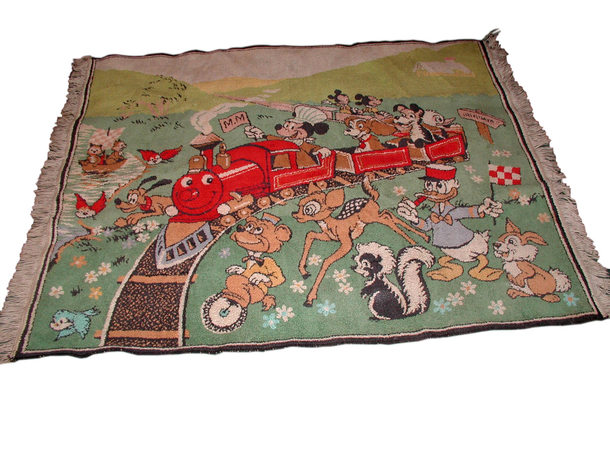 Incredible vintage adn rare Mickey Mouse wool area rug. Mickey is the train engineer with many of his Walt Disney cartoon friends on board including Mickey's niece and nephew, lady and tramp, and Donald Duck's nephew Huey.
Observing and cheering