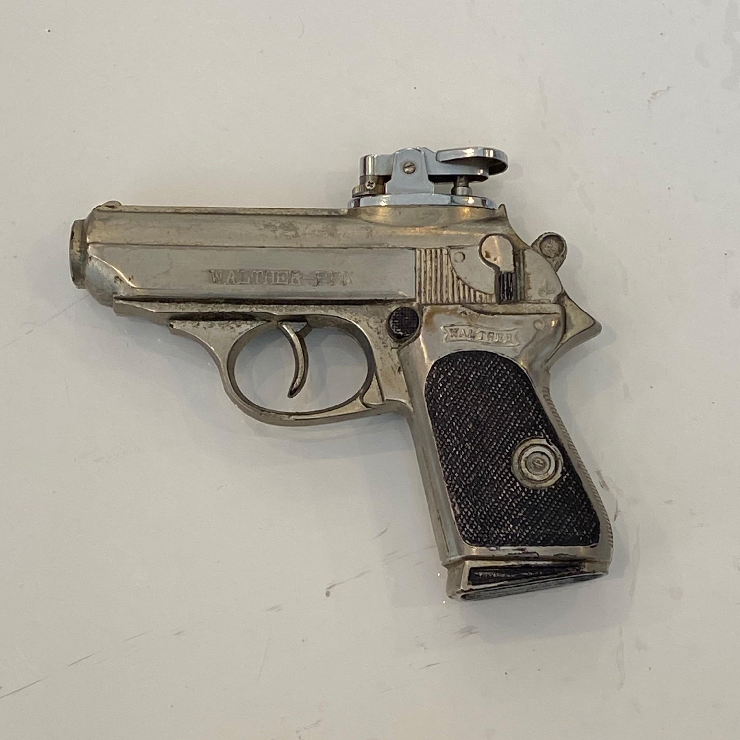 Cool vintage lighter in the shape of a Walther PPK handgun. Made of metal. Stamped 