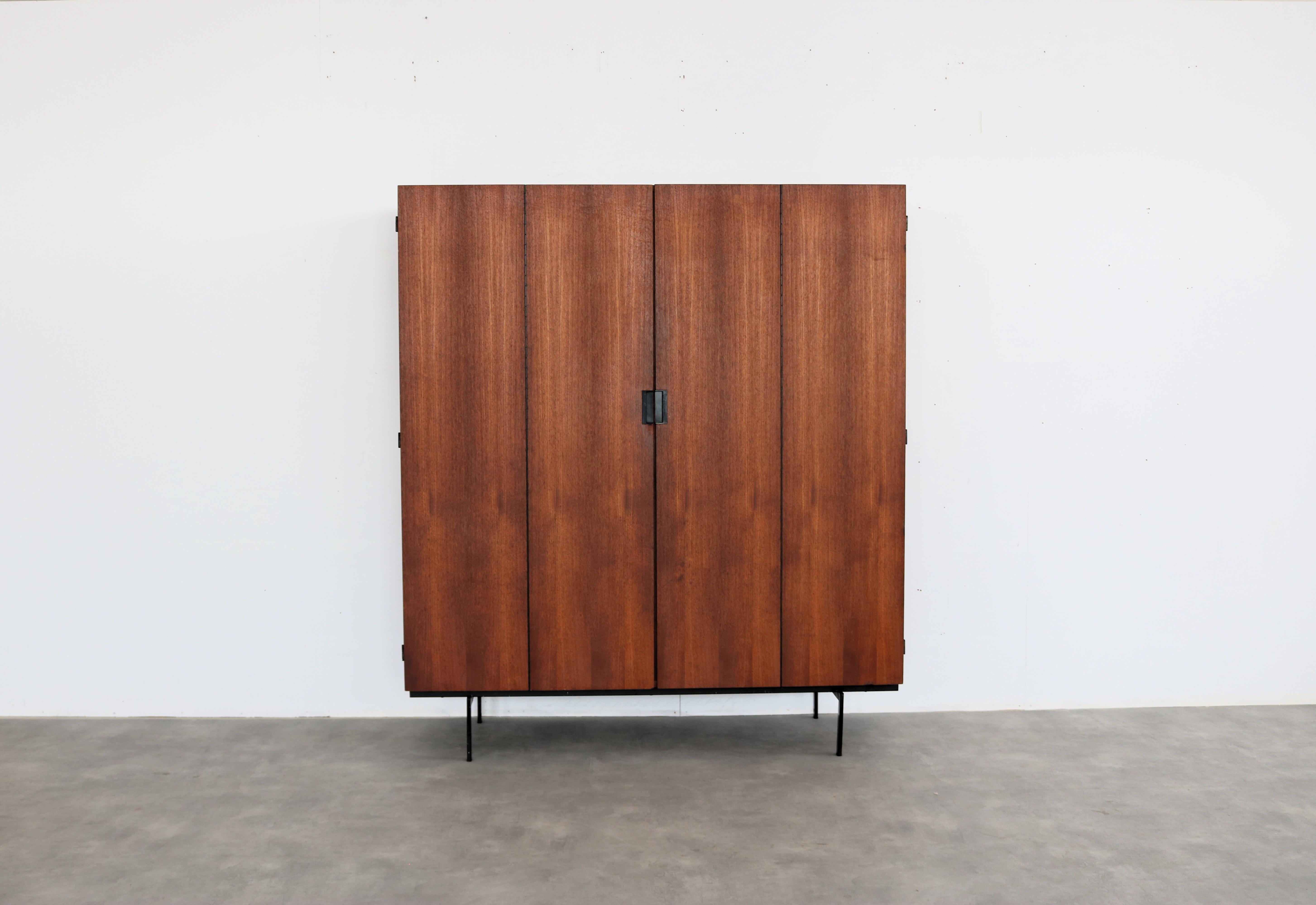 vintage wardrobe  Pastoe KU14 wardrobe  1960s

Design classic from the 1960s. The KU14 wardrobe from the Japanese series by Pastoe.

period  1960s
design  Cees Braakman  Pastoe  Netherlands
condition  good  light signs of use  veneer restorations