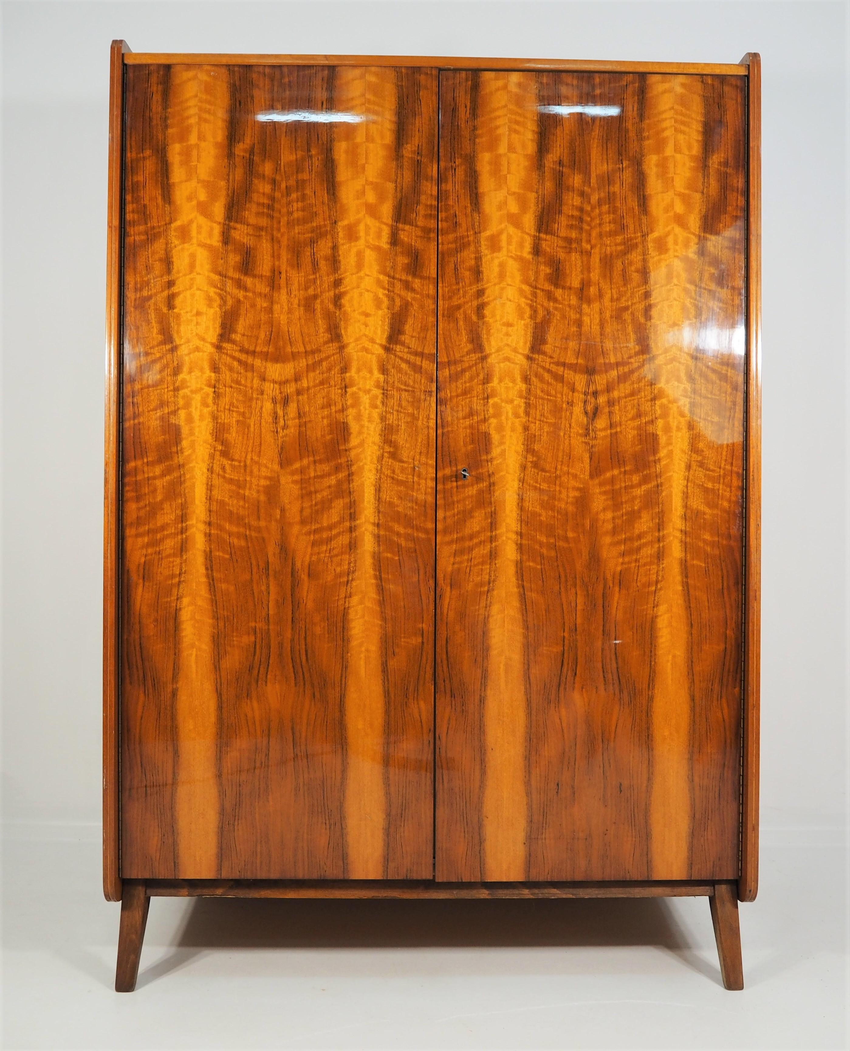 Czech wardrobe for Tatra, 1970s. Original condition. Walnut wardrobe dimensions: Height 172 cm, width 118 cm, depth 62 cm.