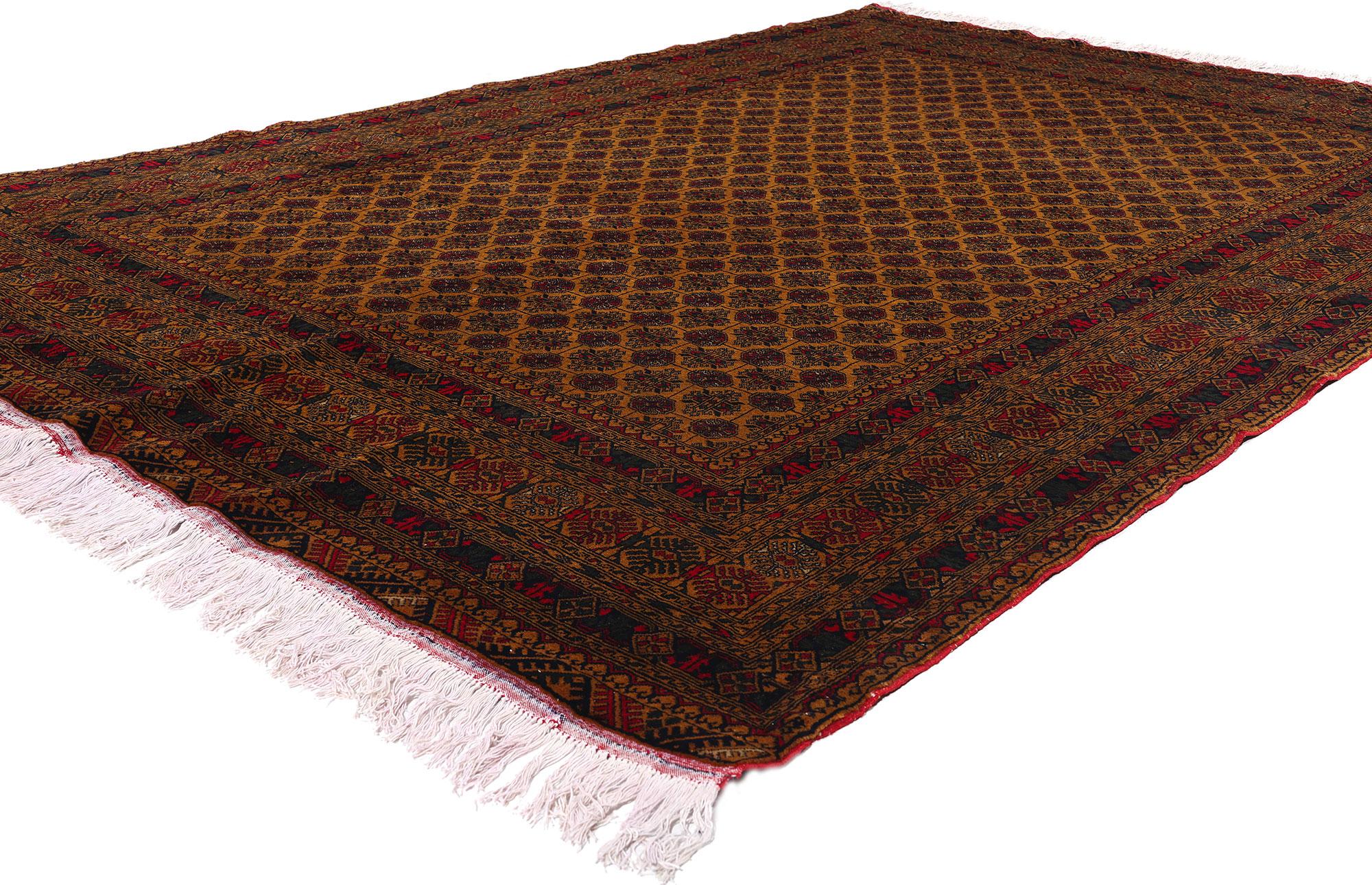 78811 Tappeto afgano Turkoman vintage, 06'05 x 09'06. Questo tappeto vintage Turkoman Afghan, annodato a mano con lana di alta qualità, mette in mostra la squisita abilità artigianale e la ricca eredità culturale della tribù Tekke. Il tappeto