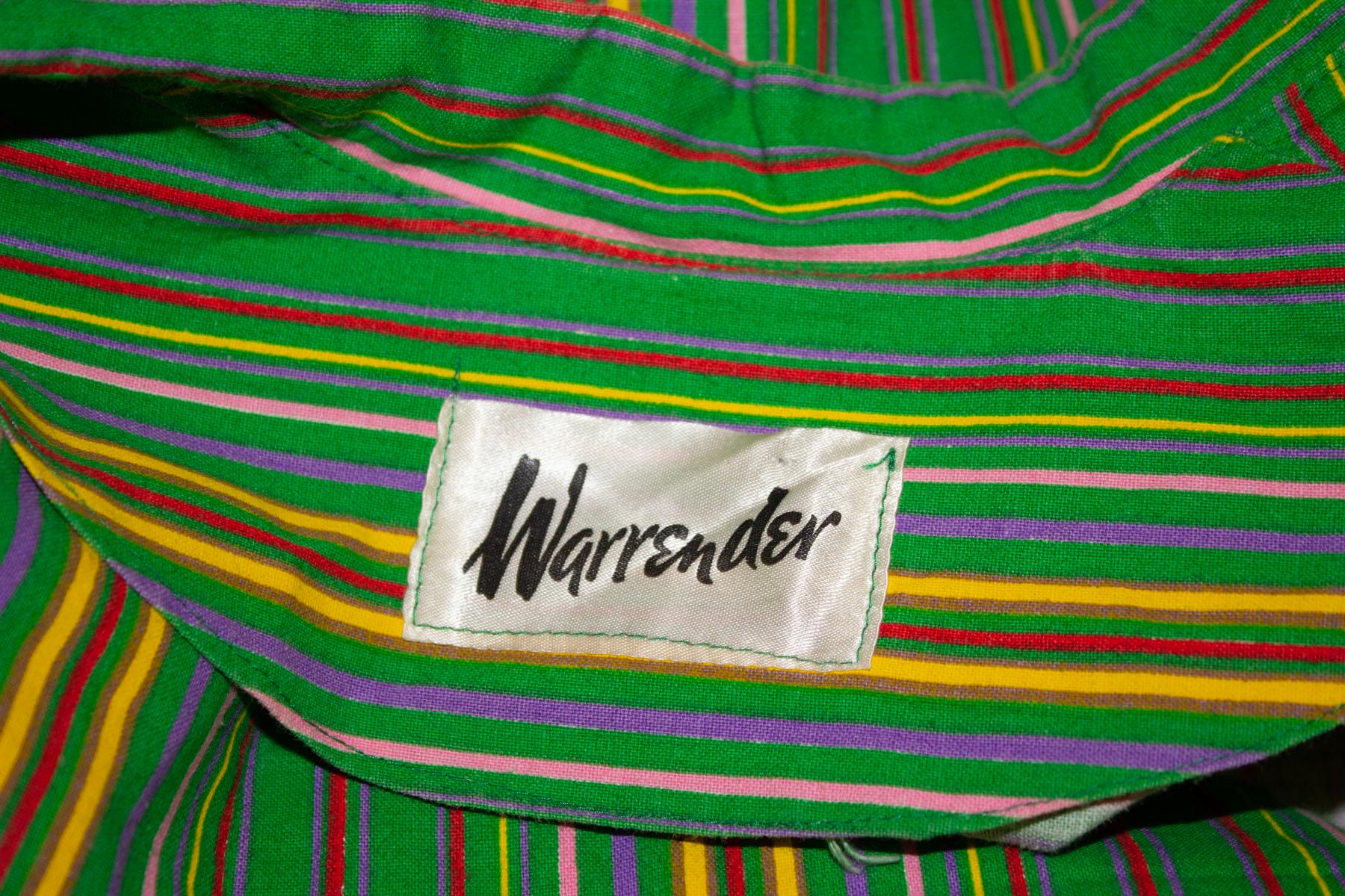 A fun and easy to wear vintage Summer dress by Warrender.  The cotton dress has a green background with multicolour stripes. It has a button front opening , short sleaves and a self fabric belt. 
Measurements: Bust up to 42'', length 42'' , belt