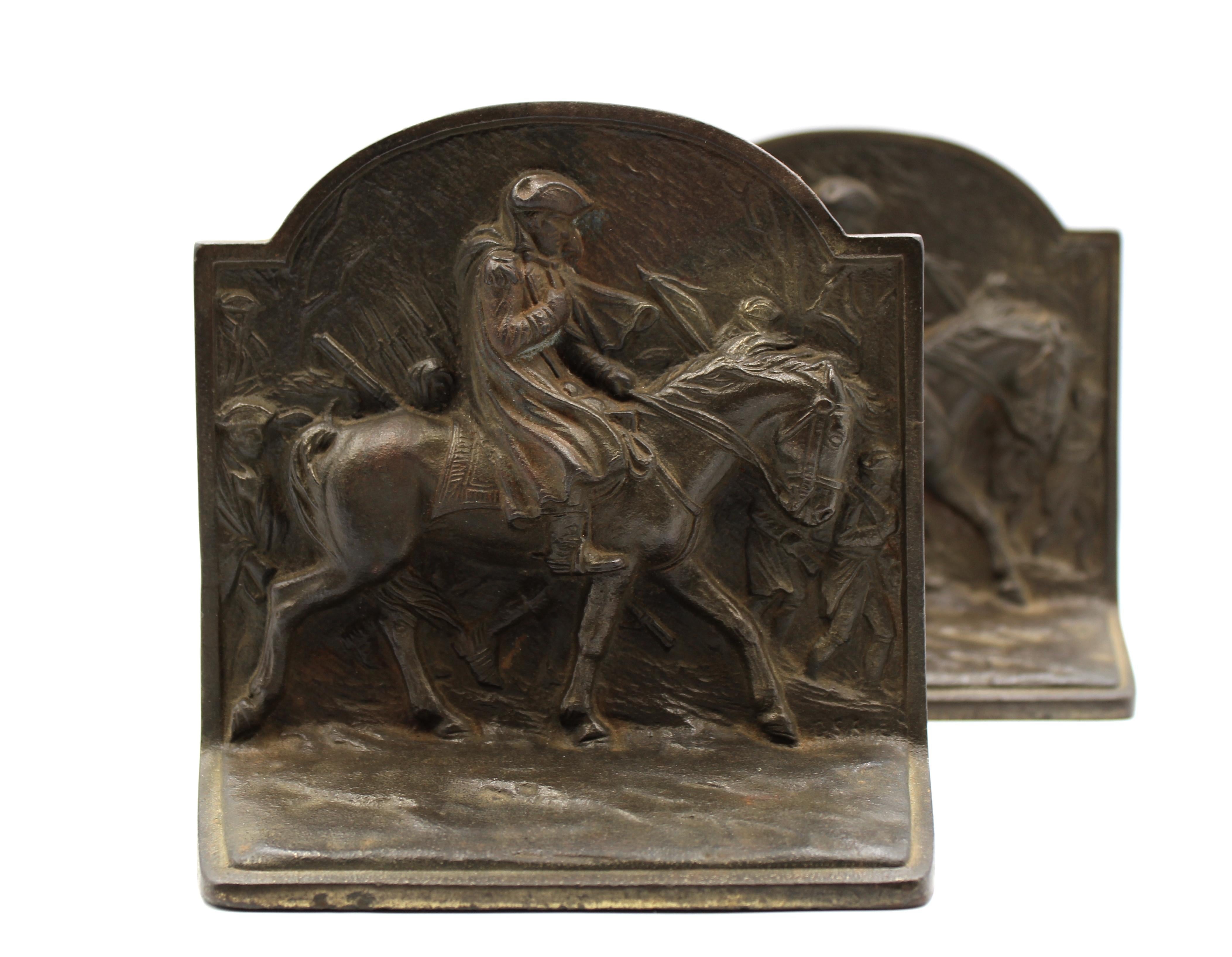 Offered is a vintage set of Washington at Valley Forge bookends. The bookends were made by the American maker Hubley Manufacturing Co. in 1925. The bookends are in the style of the famous oil painting by William B. T. Trego. The March to Valley