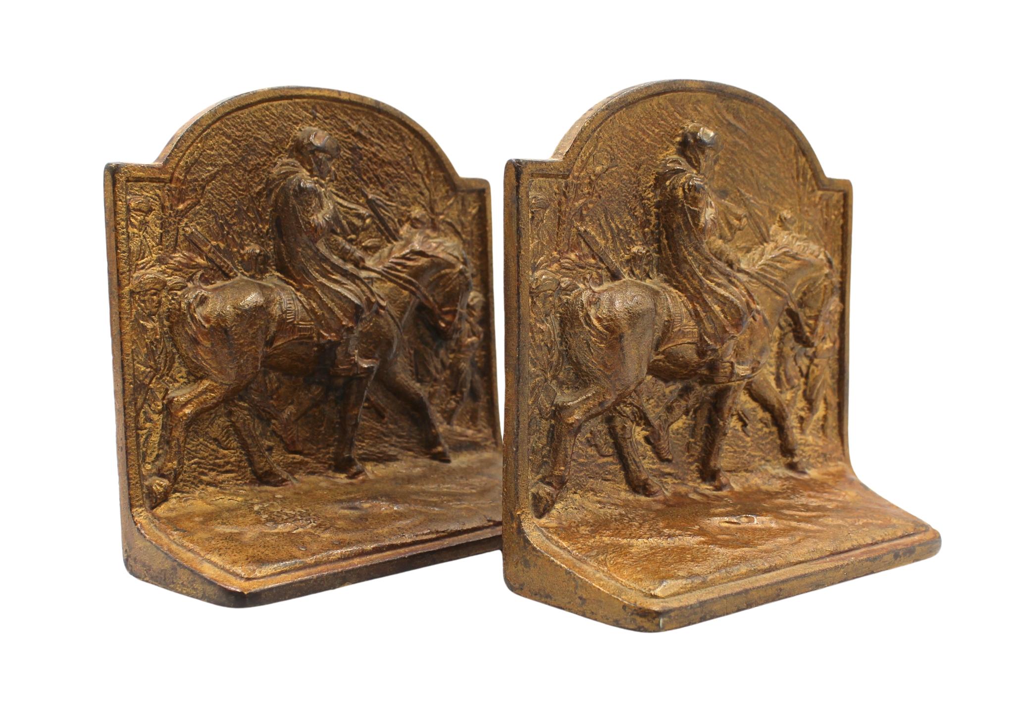 Offered is a vintage set of Washington at Valley Forge bookends. The bookends were made by the American maker Hubley Manufacturing Co. in 1925. The bookends are in the style of the famous oil painting by William B. T. Trego. The March to Valley