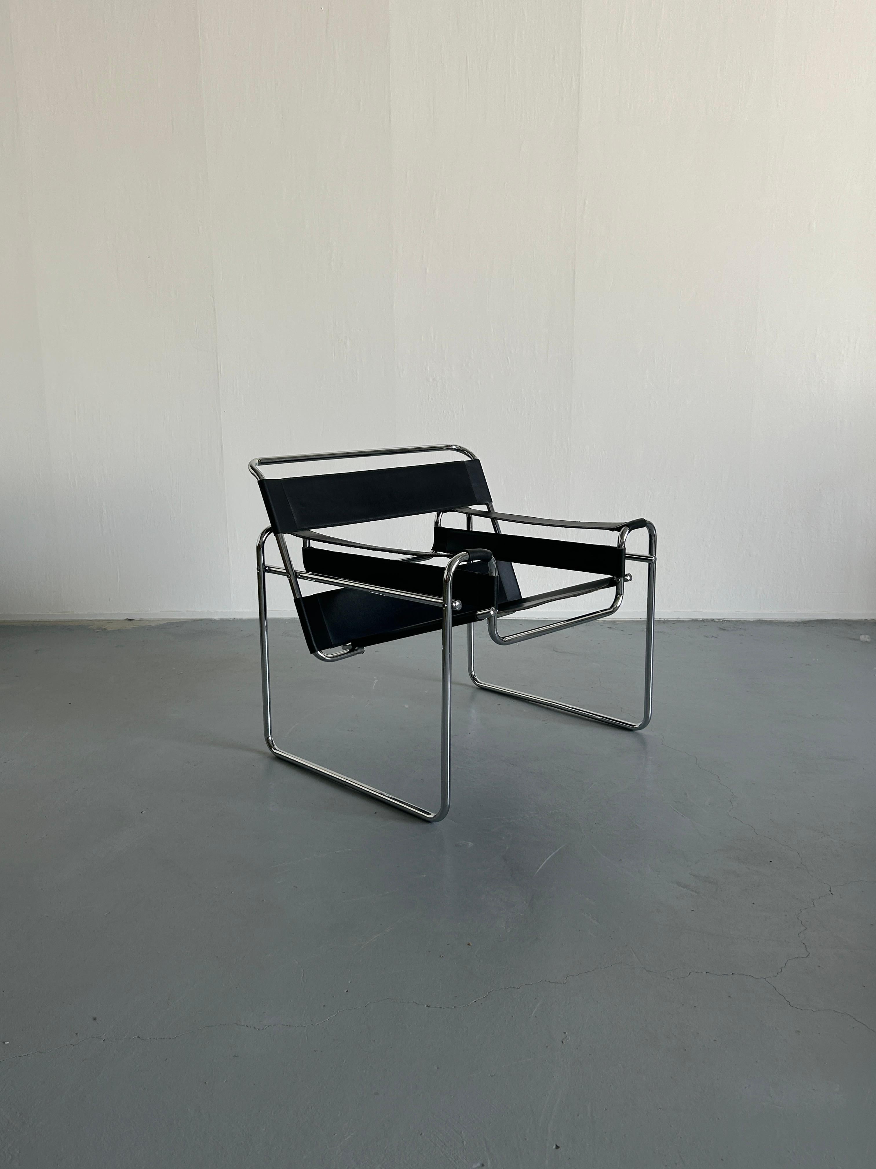 The iconic Wassily armchair designed by Marcel Breuer in 1925-1926, also known as the 'B3' chair. 
Unknown, but quality vintage Italian production, circa 1970s. 

Made from thick leather and chrome.

Overall in good vintage condition with some