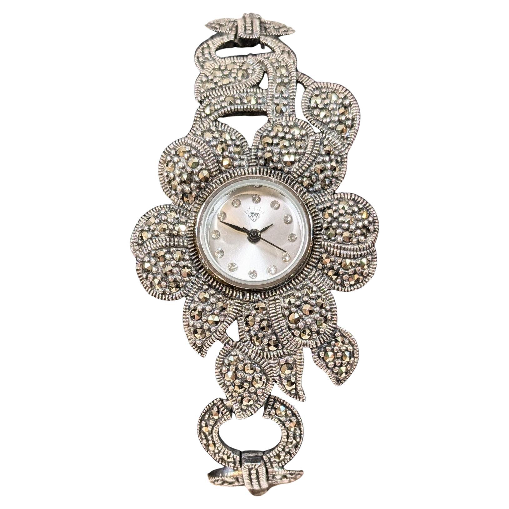 Montre vintage en argent sterling 925 et zircons