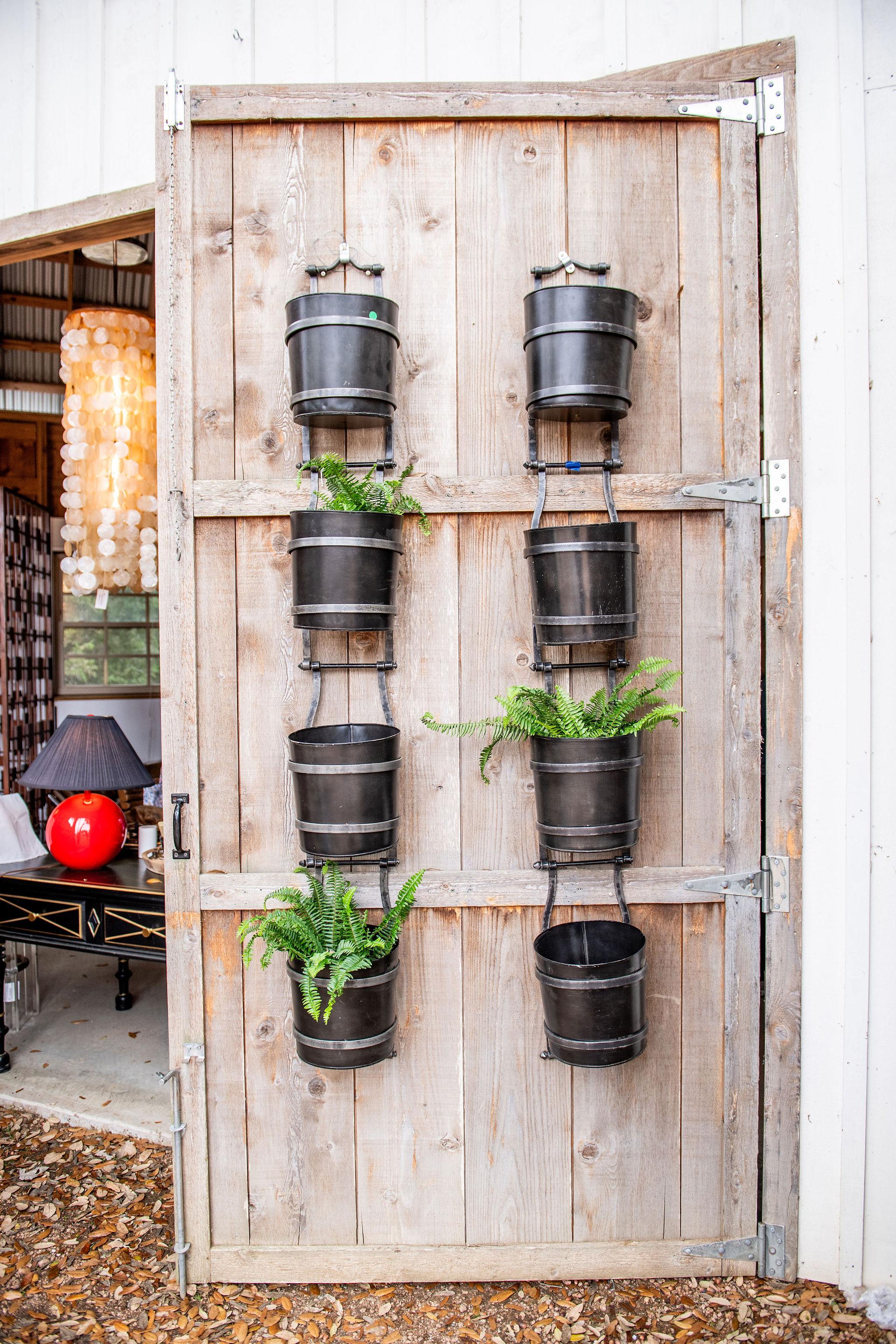 Wonderful Vintage 20th Century water mill buckets for planting or decoration.  These bucket chains evoke a feeling of warmth and age and provide a creative way to display your plantings or other decorations.

To view all of  our listings at Tiffany