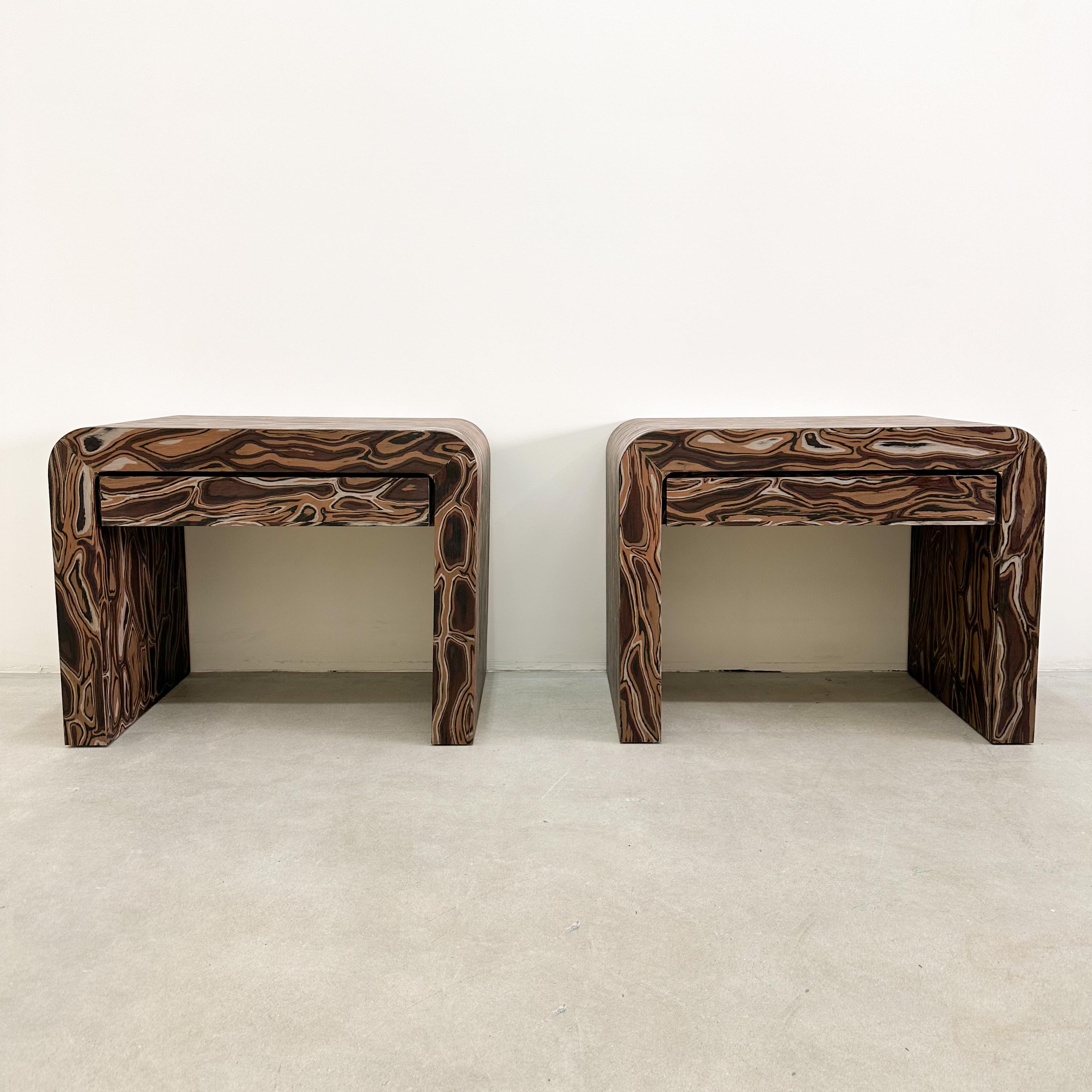 Pair of Vintage Waterfall Nightstands Featuring Kengo Kuma Veneer.

The vintage nightstands have been meticulously re-veneered, featuring the original design by Kengo Kuma, a renowned architect recognized for his adept use of natural materials to