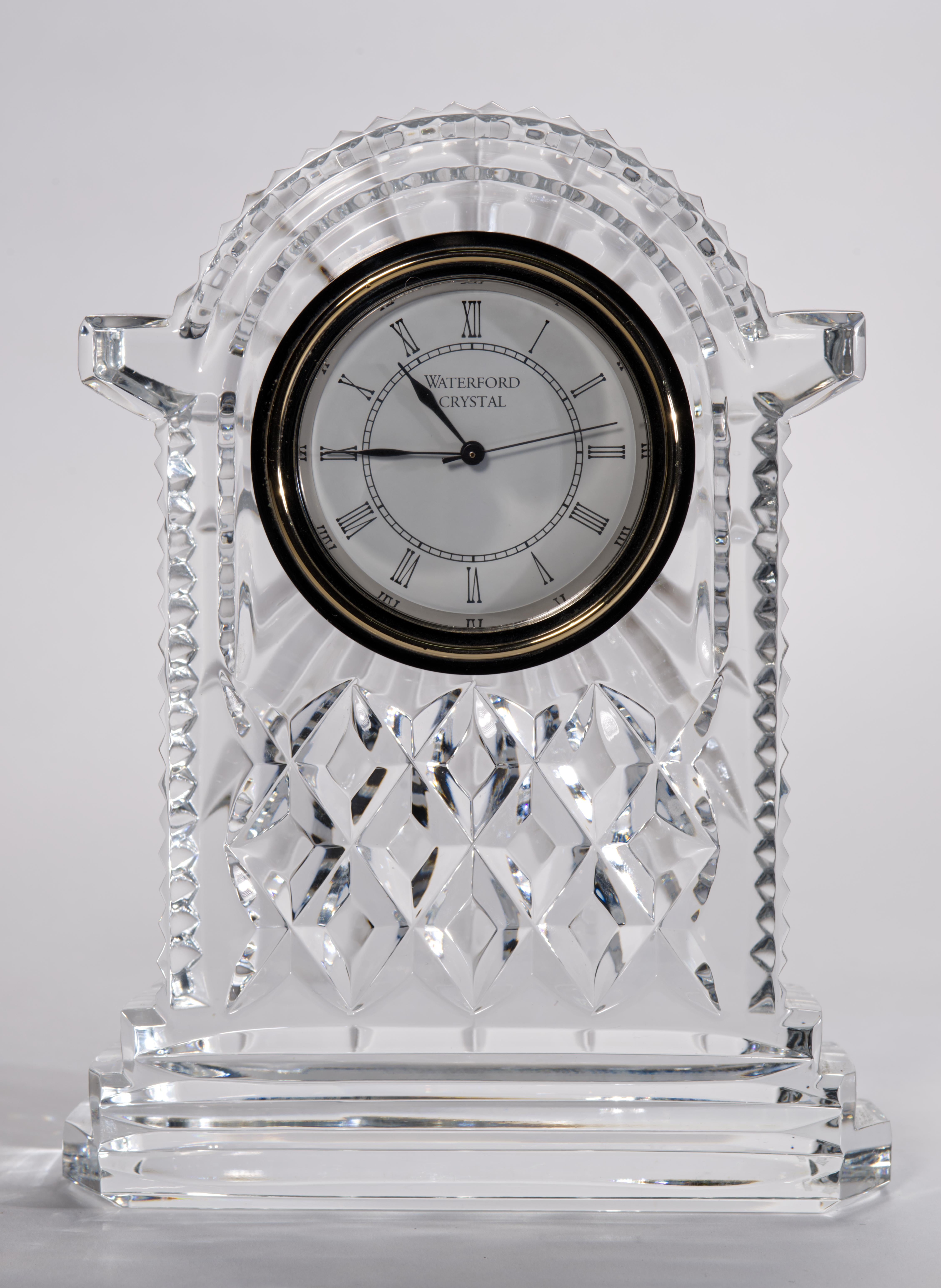 An elegant addition to any mantle or desk, the Lismore Carriage Clock features an elegant cream clockface with Roman numerals and brass finish, set in a sweeping frame of fine, handcrafted crystal intricately detailed with Lismore's signature