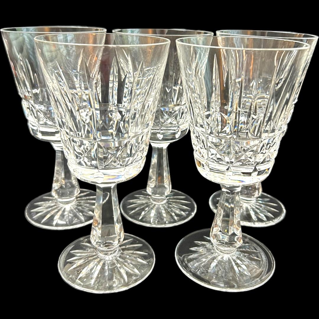 Elevate your drinking experience with these vintage Waterford “Kylemore” crystal wine glasses from Ireland.  The 5 glasses are crafted with clear crystal material, adding an elegant touch to any table setting.  The glasses are perfect for any