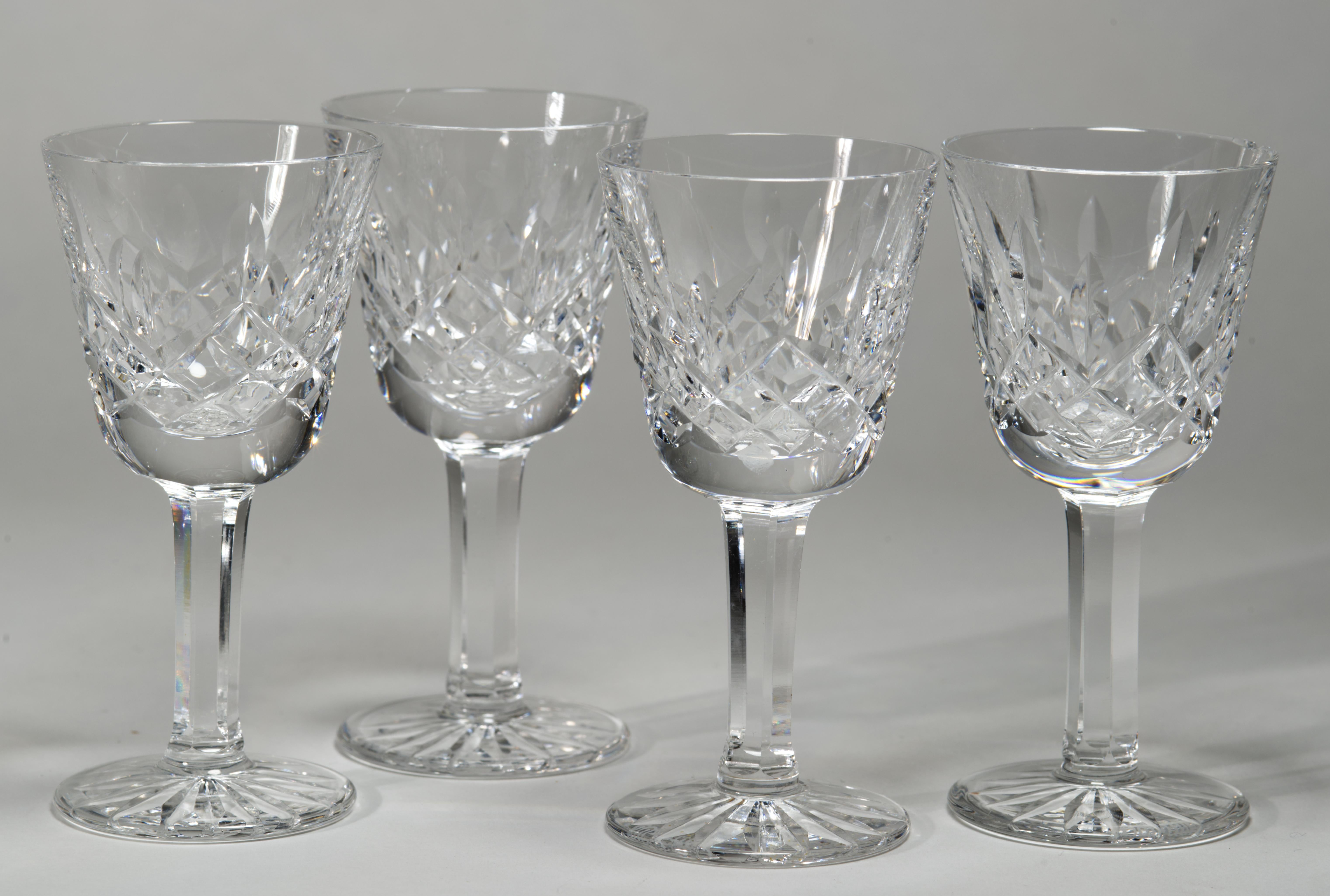 The set of 4 liqueur or cordial glasses features vertical cut design on the bowl in Lismore pattern.

The set is in very good vintage condition. The glasses are standing 3.5