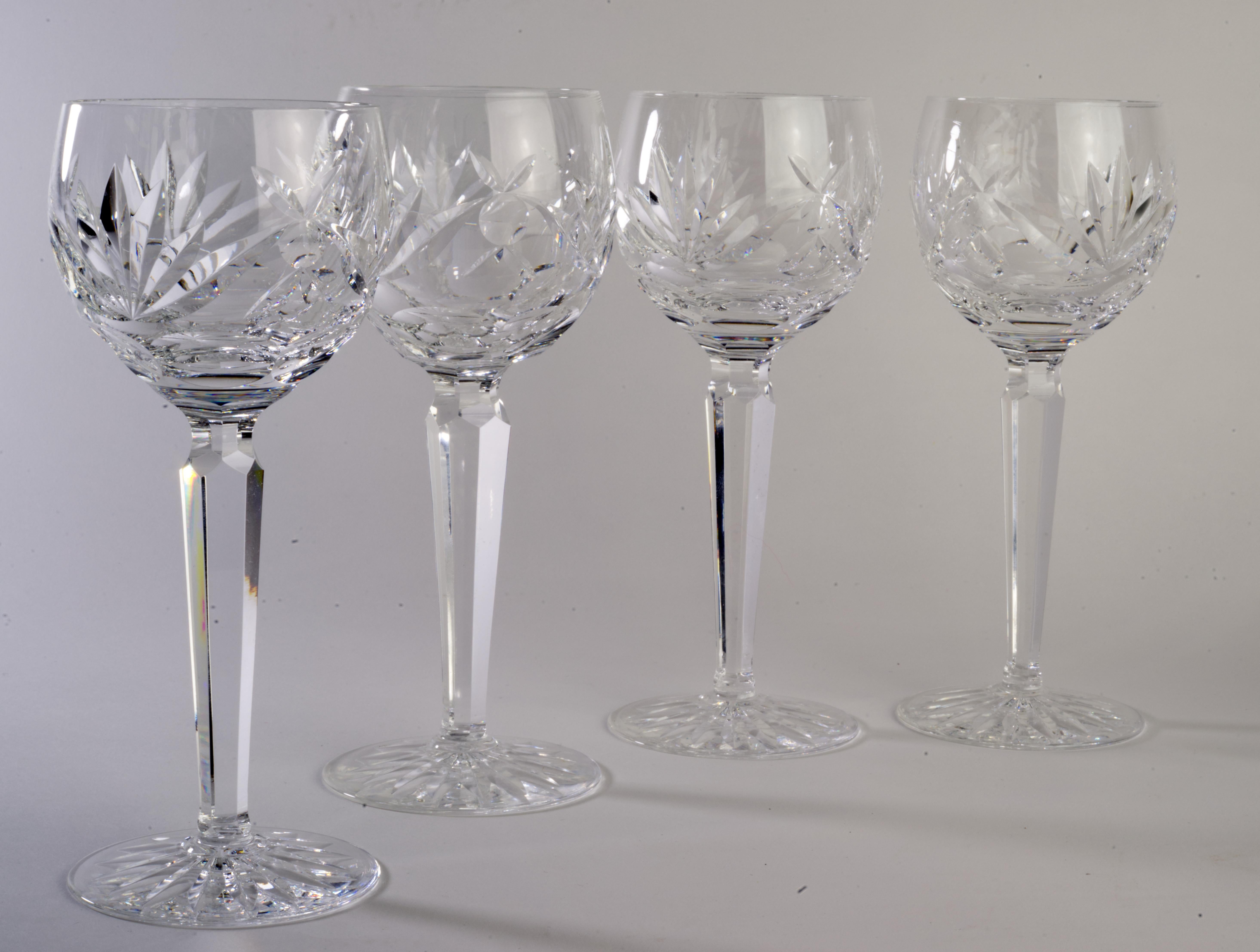  Vintage set of 4 hock wine glasses was made by Waterford in Ashling pattern, with 2 sets available at the time of the listing. Ashling pattern is described by cut fans and panels and multisided stem; the pattern was produced from 1968 to