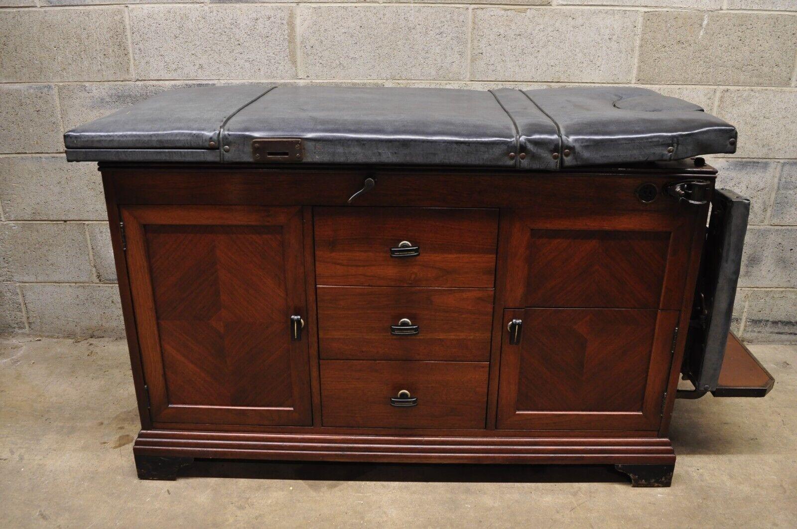 Vintage W.D. Allison Co Art Deco Adjustable Medical Examination Exam Table. Item featured has an adjustable back and foot rest, plug for outlets, original tag, very nice vintage exam table.
Circa 1930s. Measurements: 31.5