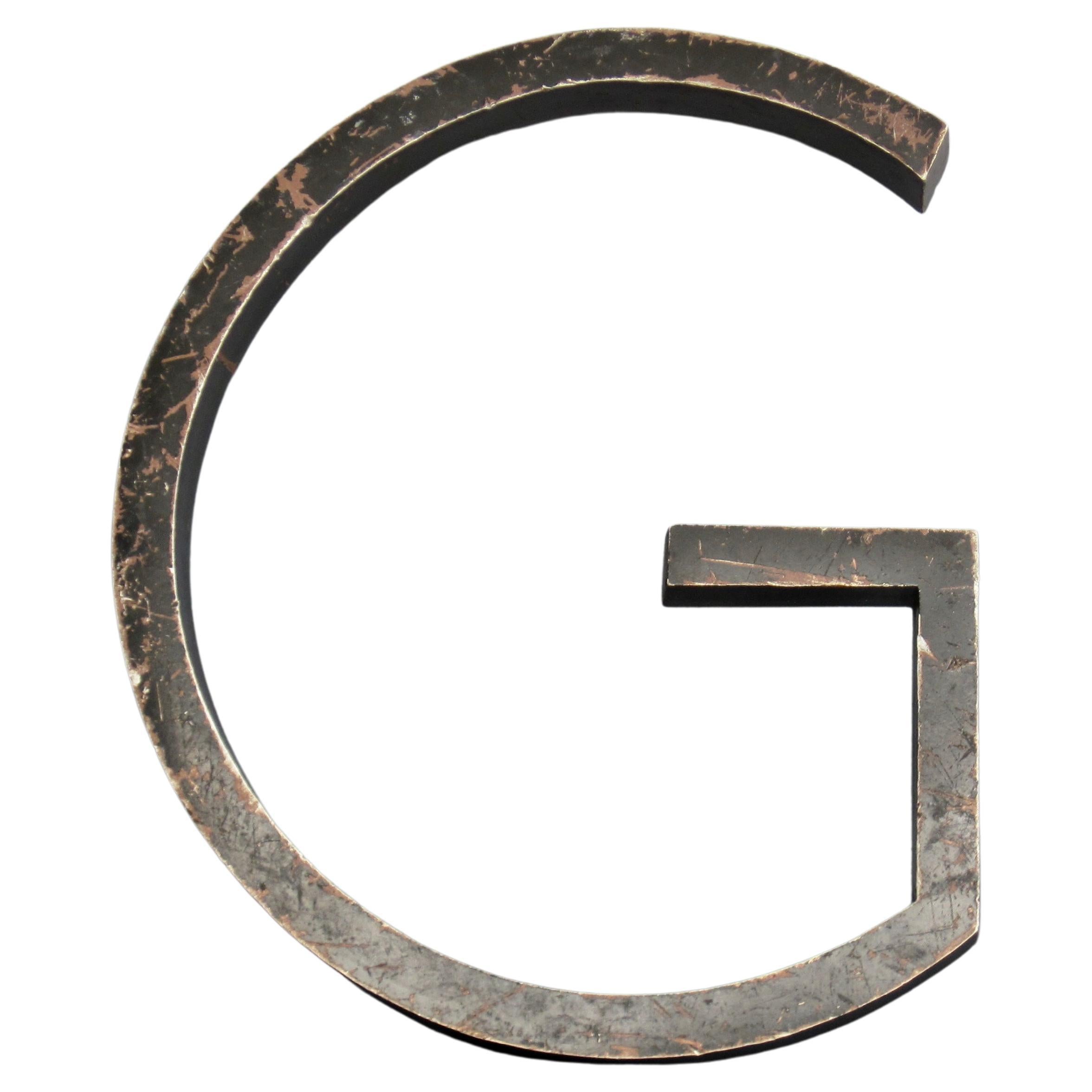 Vintage Weathered Metal Letter G Wall Emblem For Sale