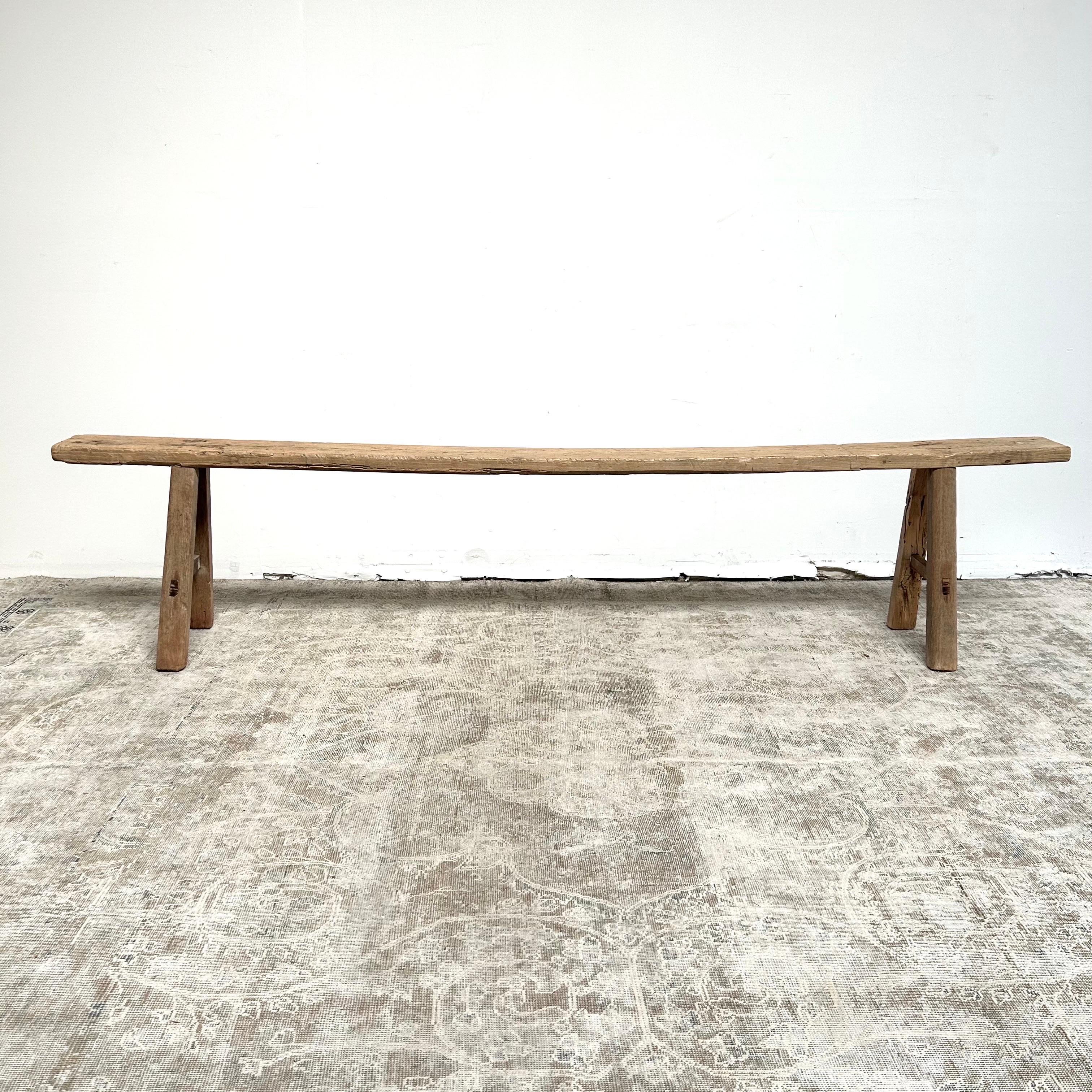Beautiful one of a kind Elm bench 
A weathered aged patina that only happens over time.
Size: 103”w x 15”d x 22”h 
Seat top Depth:7”
Sturdy, ready for use, and great as an entry bench, long hall, or gallery.