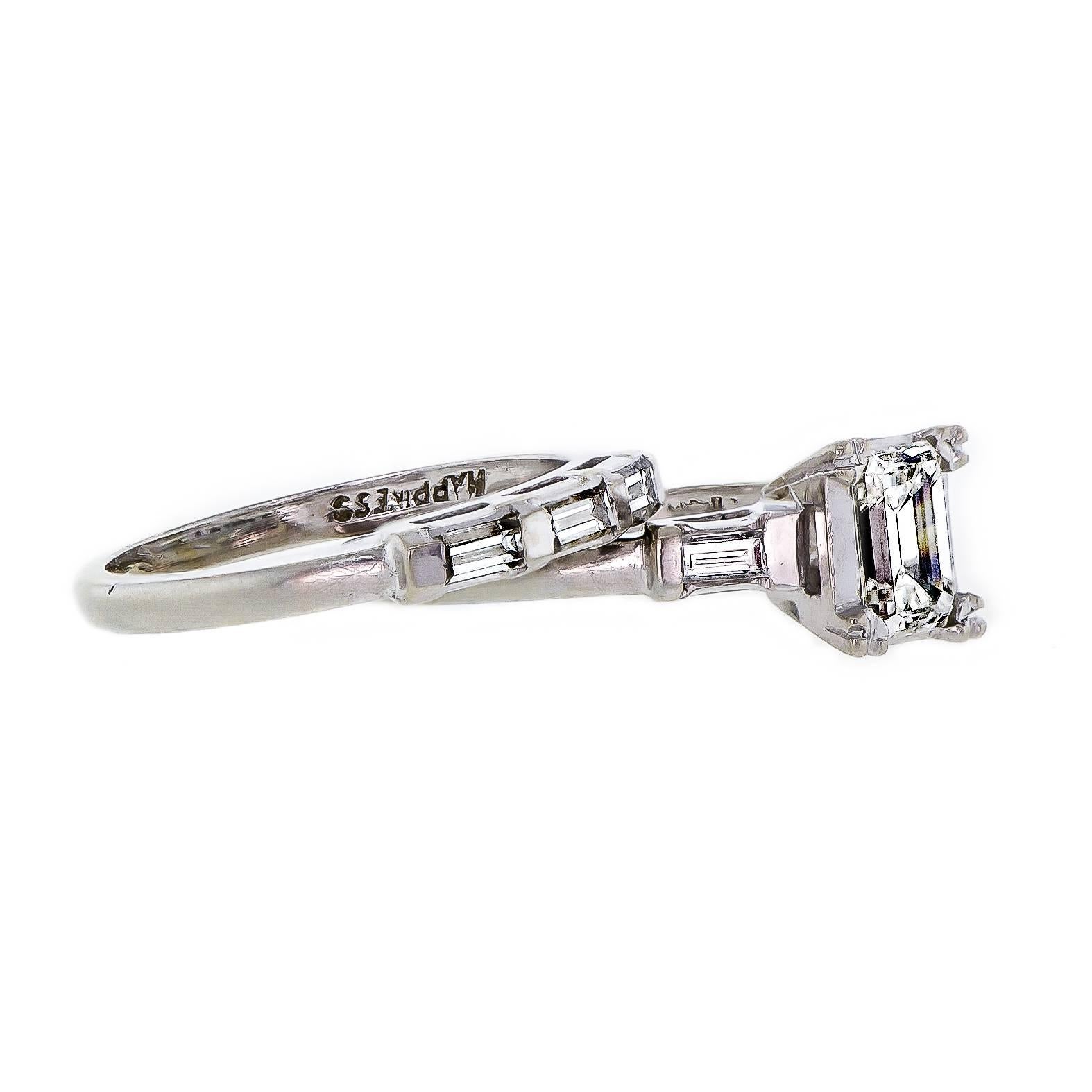 Vintage diamond and 14k white gold lady's engagement ring and wedding band - set with one illusion set emerald cut diamond approx .80 ct. VS1 Clarity -  HIJ color and five channel set baguette cut diamonds approximate total weight .50 cts. VS-1 VS-2