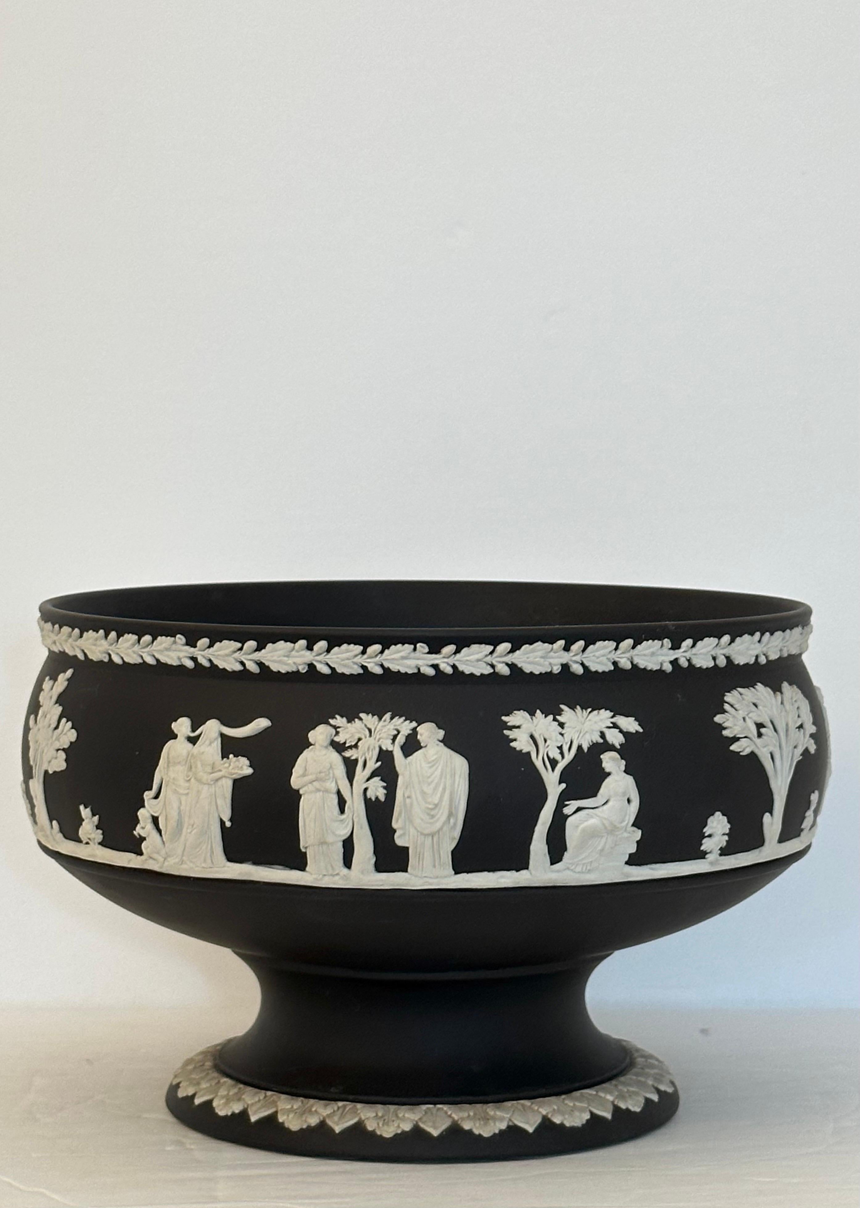 We are very pleased to offer a stunning footed bowl from Wedgwood, crafted in England, dating back to the 1960s.  Wedgwood stands as a pillar in the British ceramics industry, having influenced styles and preferences for over 260 years.  The company