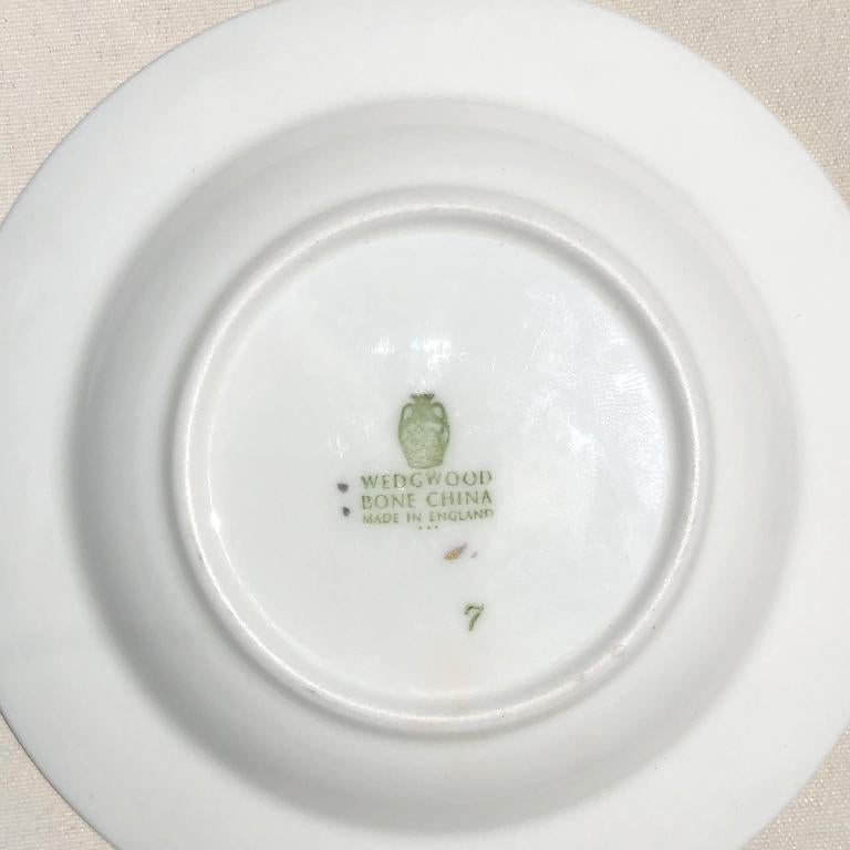 Vintage Wedgwood bone China small plate Queen Elizabeth Silver Jubilee 1977 ER II. This piece was circulated for the Queen of England's Royal Jubilee in the 1970s. Some wear throughout. We would use this gem as a catchall on a nightstand, bar or