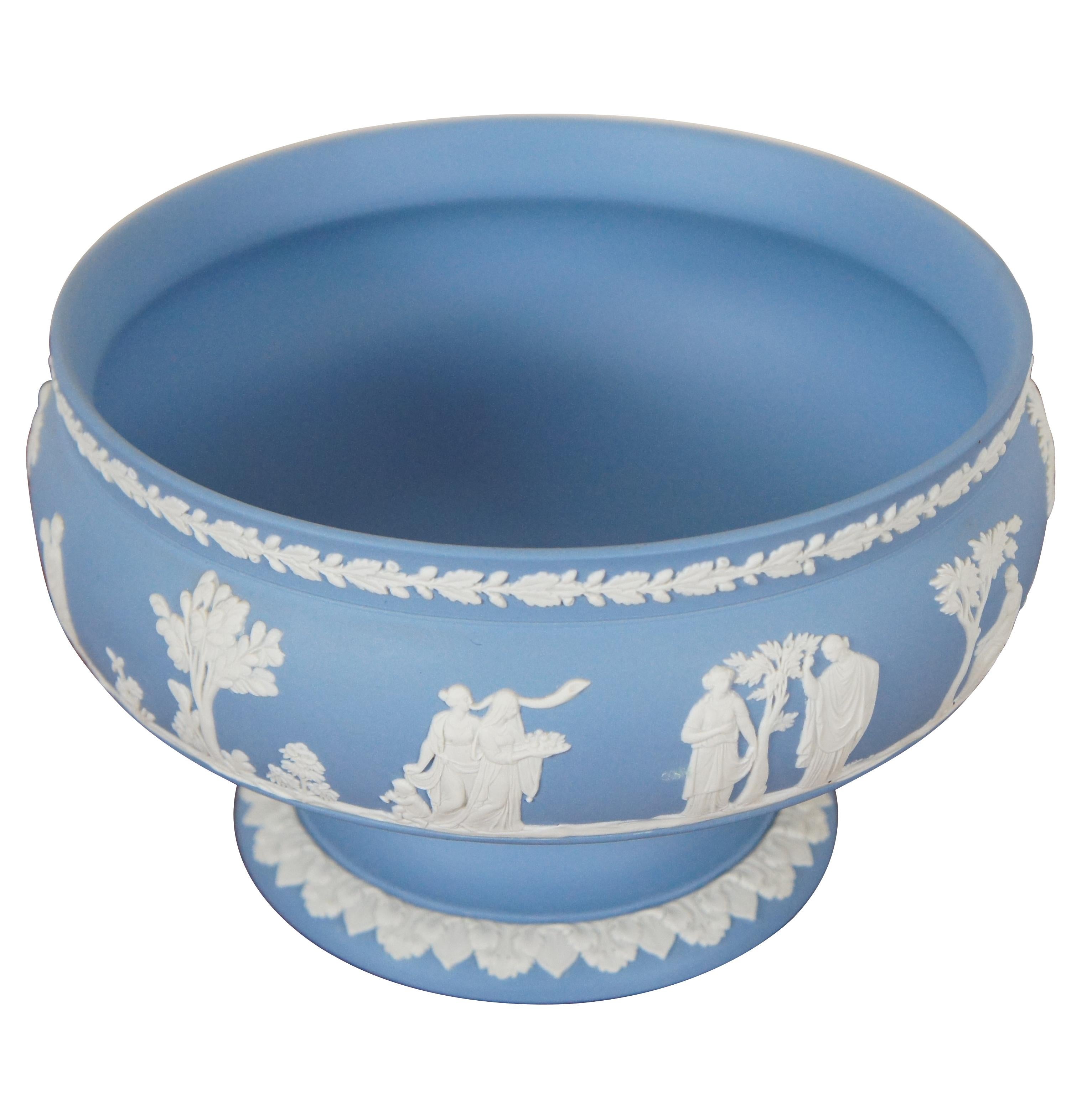 Wedgwood jasperware pedestal bowl / centerpiece featuring Wedgwood’s signature neoclassical figures and trim in cream on lavender / light blue coloring.