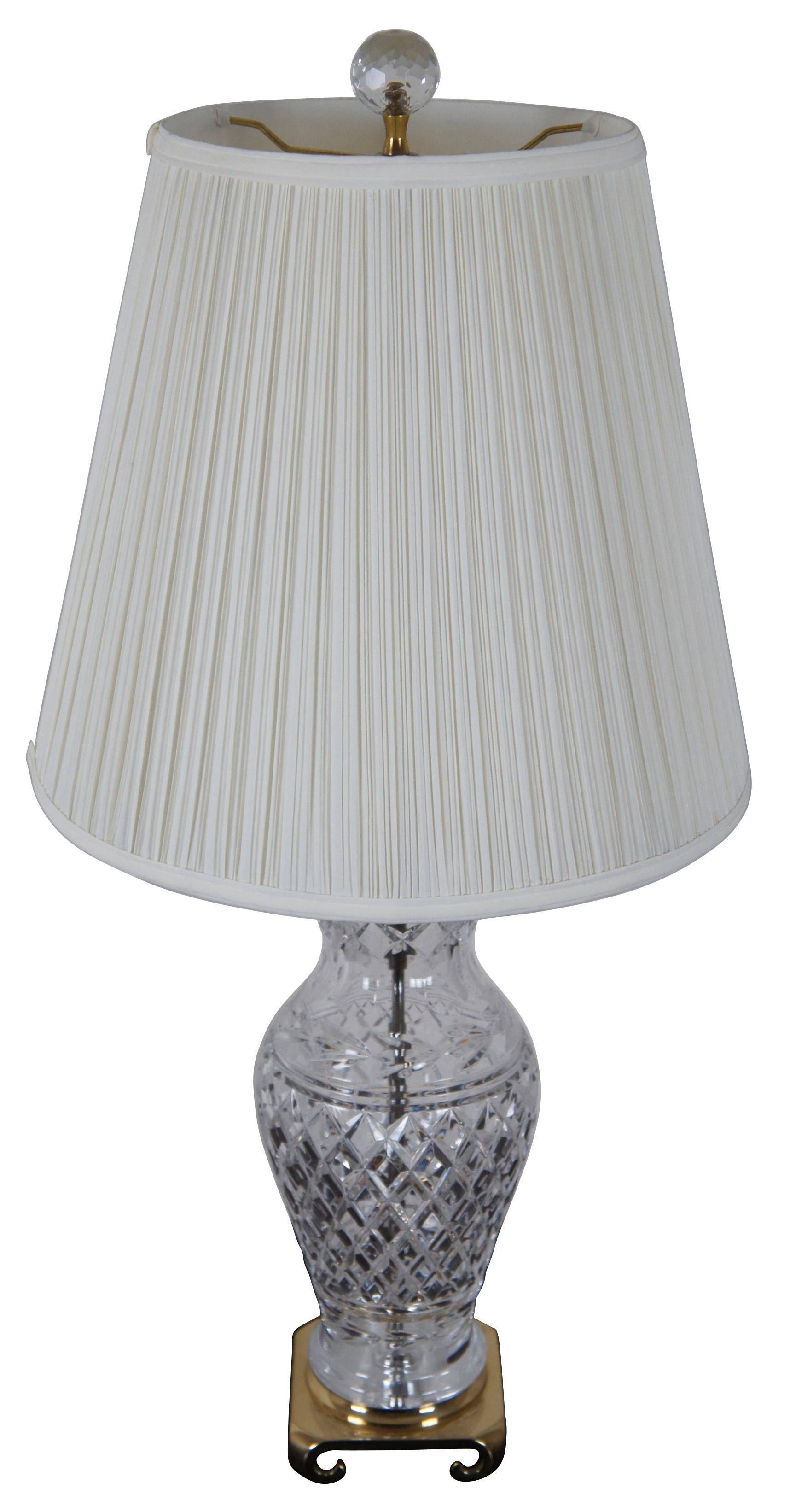 Vintage Waterford Glandore cut crystal and Wedgwood table lamp with Crescent brass base and round faceted finial.

Measures: Shade - 14” x 12.25” / Height to top of finial – 28.625” (Diameter x Height).
 