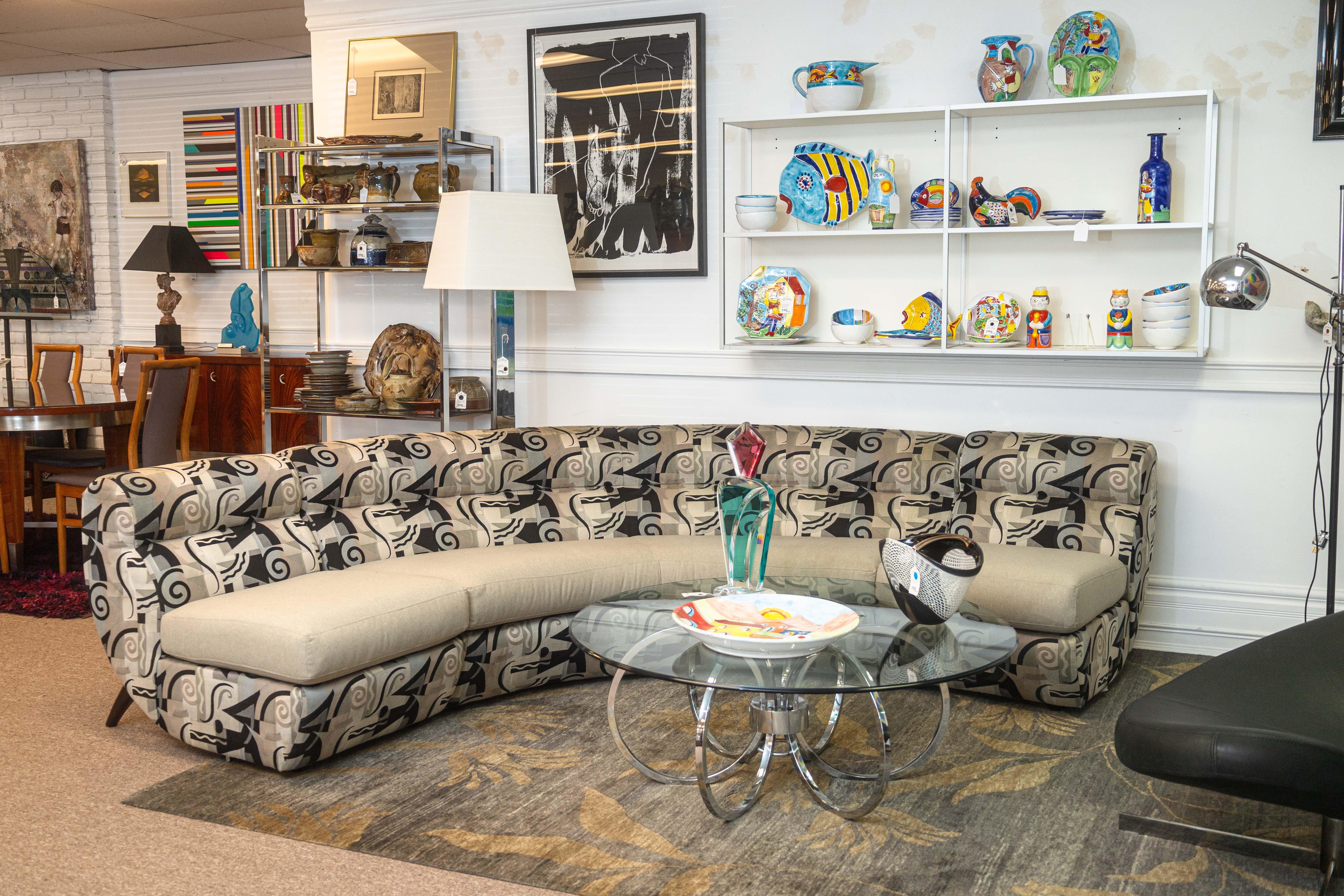 A vintage custom made Weiman Preview sectional sofa. This is a stunning curved sectional sofa featuring 3 pieces in total. There is one curving corner section, and two seat sections. These pieces are modular and can be arranged in a variety of ways,