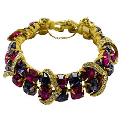 Vintage WEISS signed gold tone pink purple rhinestones designer bracelet