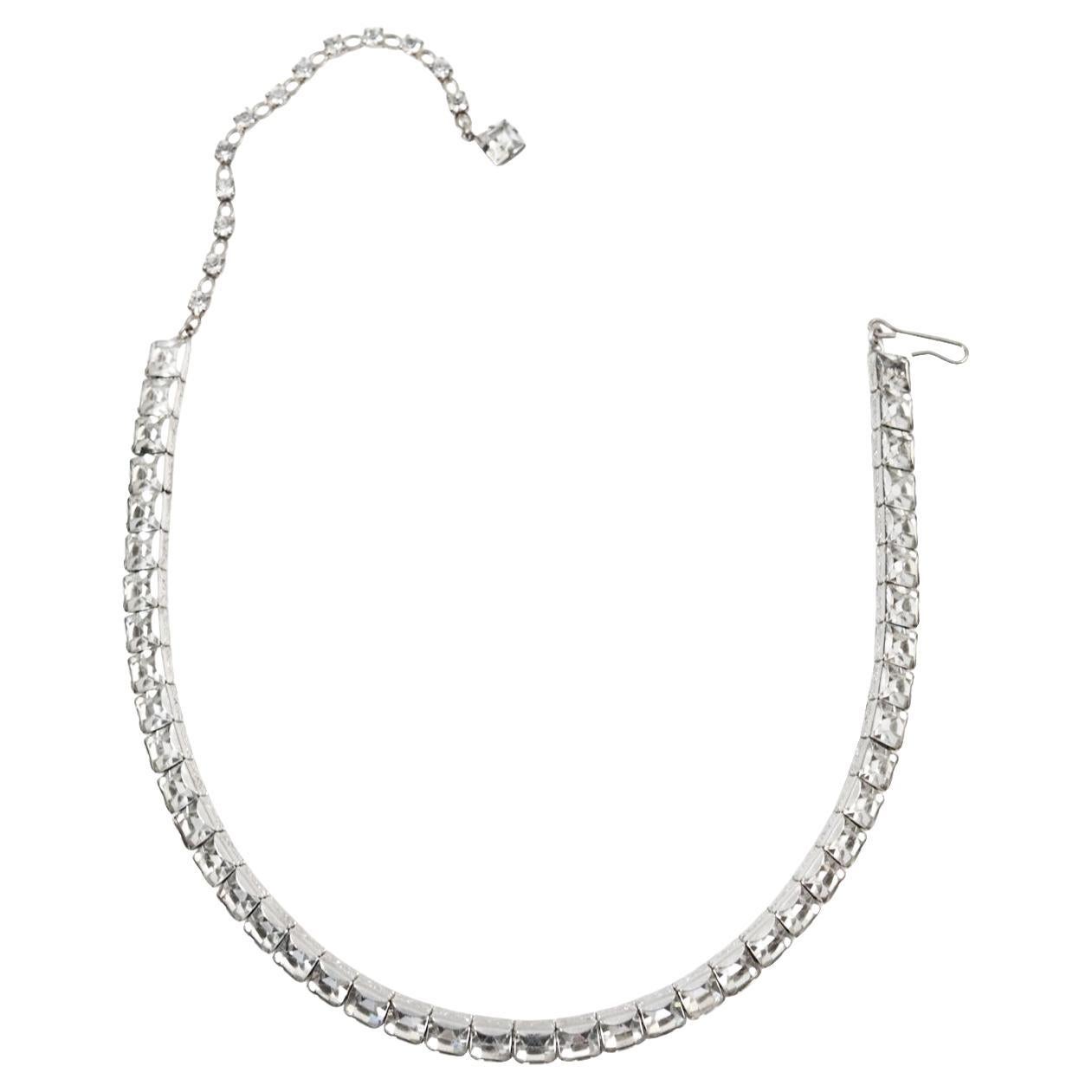 Vintage Weiss Silver Tone Channel Set Diamante Choker Circa 1960's. This is a design since the beginning of time that will always be in style. It is minimal but chic and says it all.  I sold so many of these at Barneys New York. Women would buy
