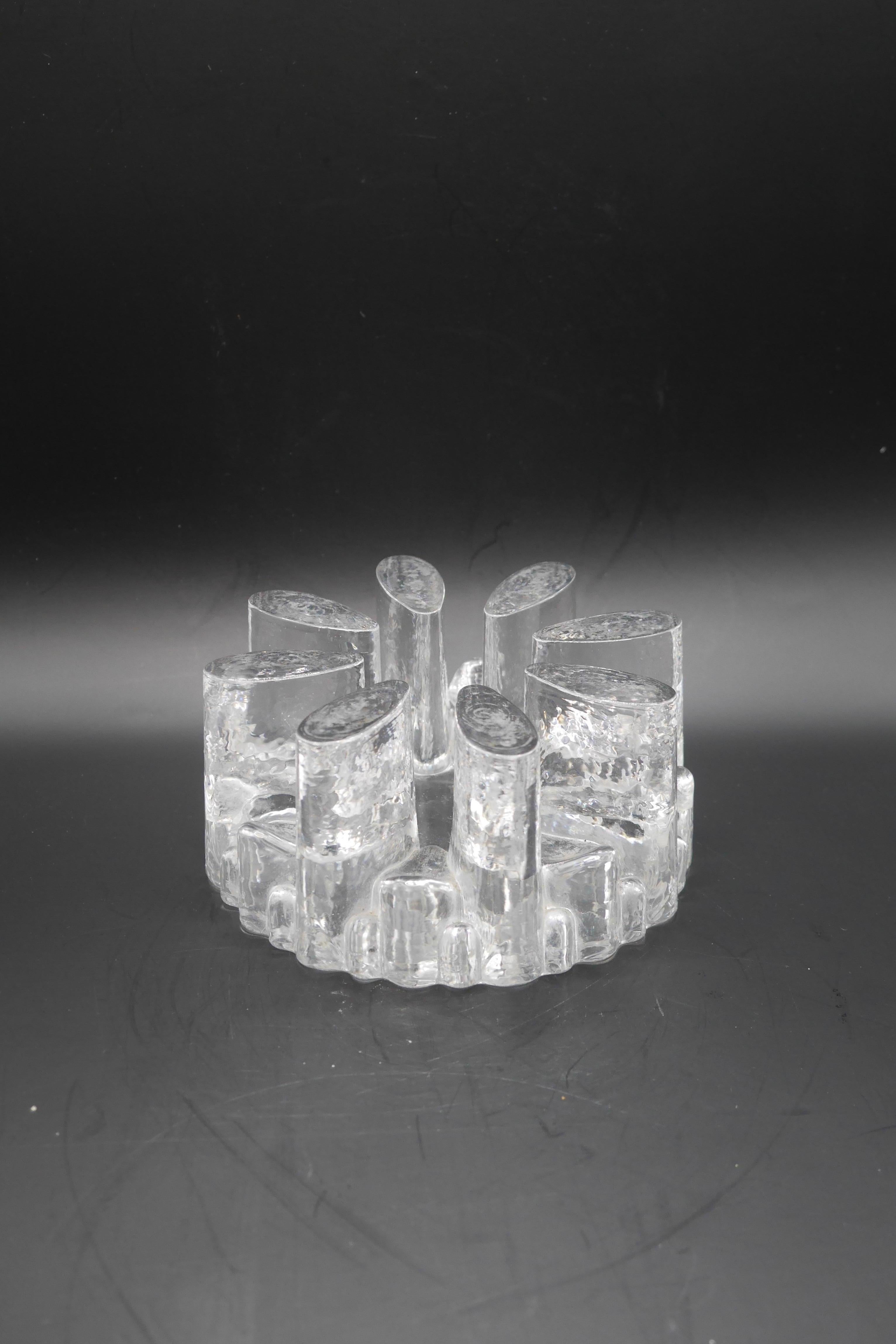 A stunning candle holder from Belmondo Glass, Georgshutte in West Germany, circa 1985. This item can also be used as a warmer for tea or coffee. Made from solid crystal, it produces a beautiful patterned light when a candle is lit inside it.