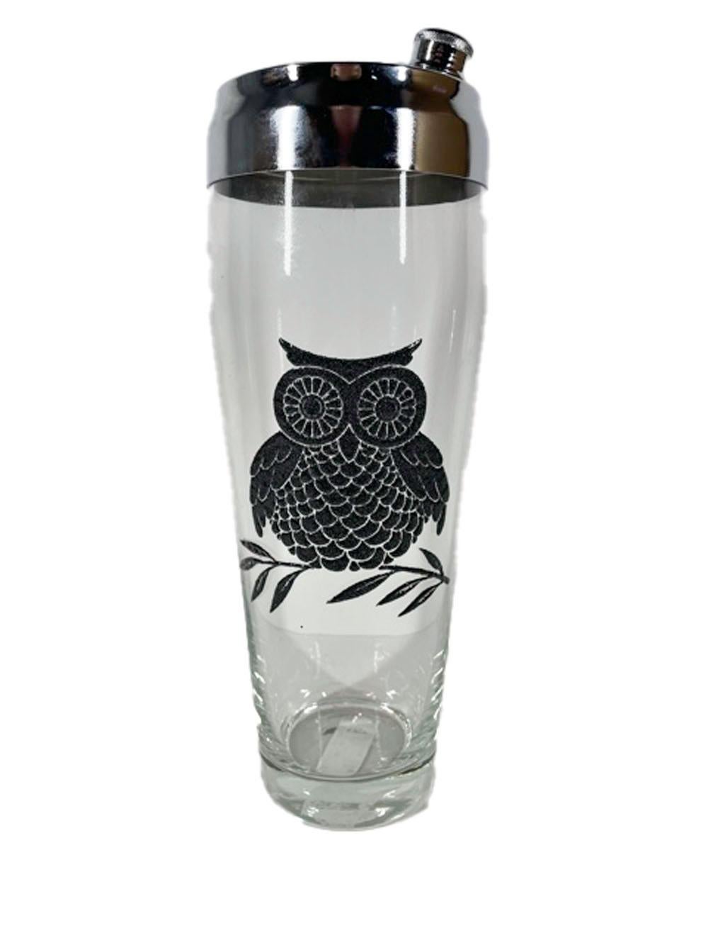 Mid-Century Modern cocktail Shaker set consisting of a cocktail Shaker and 6 rocks glasses in clear glass with a black enamel owl perched on a branch.