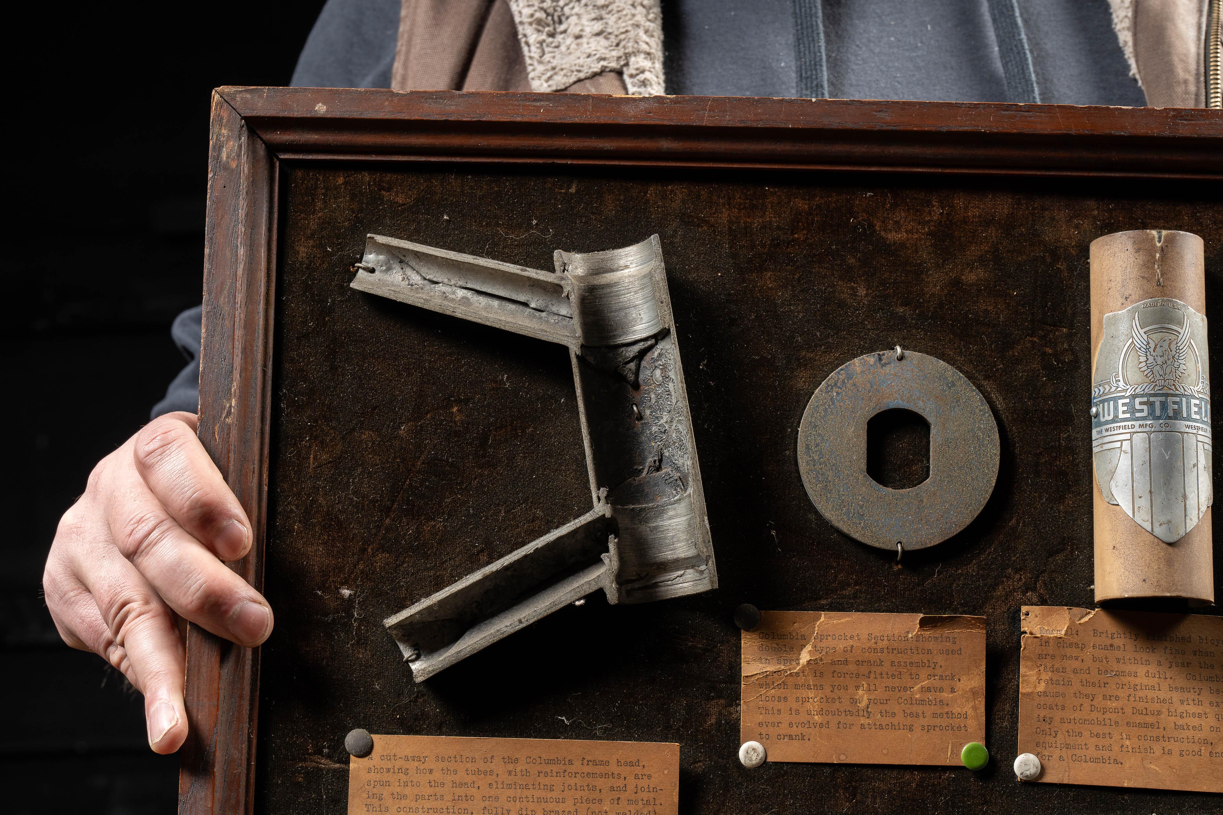 c. 1920s/1930s; The Westfield Manufacturing Co. - Westfield, MA

Antique historical bike parts wall-mounted display.

This piece serves as a salesman sample-type display used to advertise the various hardware and attachments manufactured by
