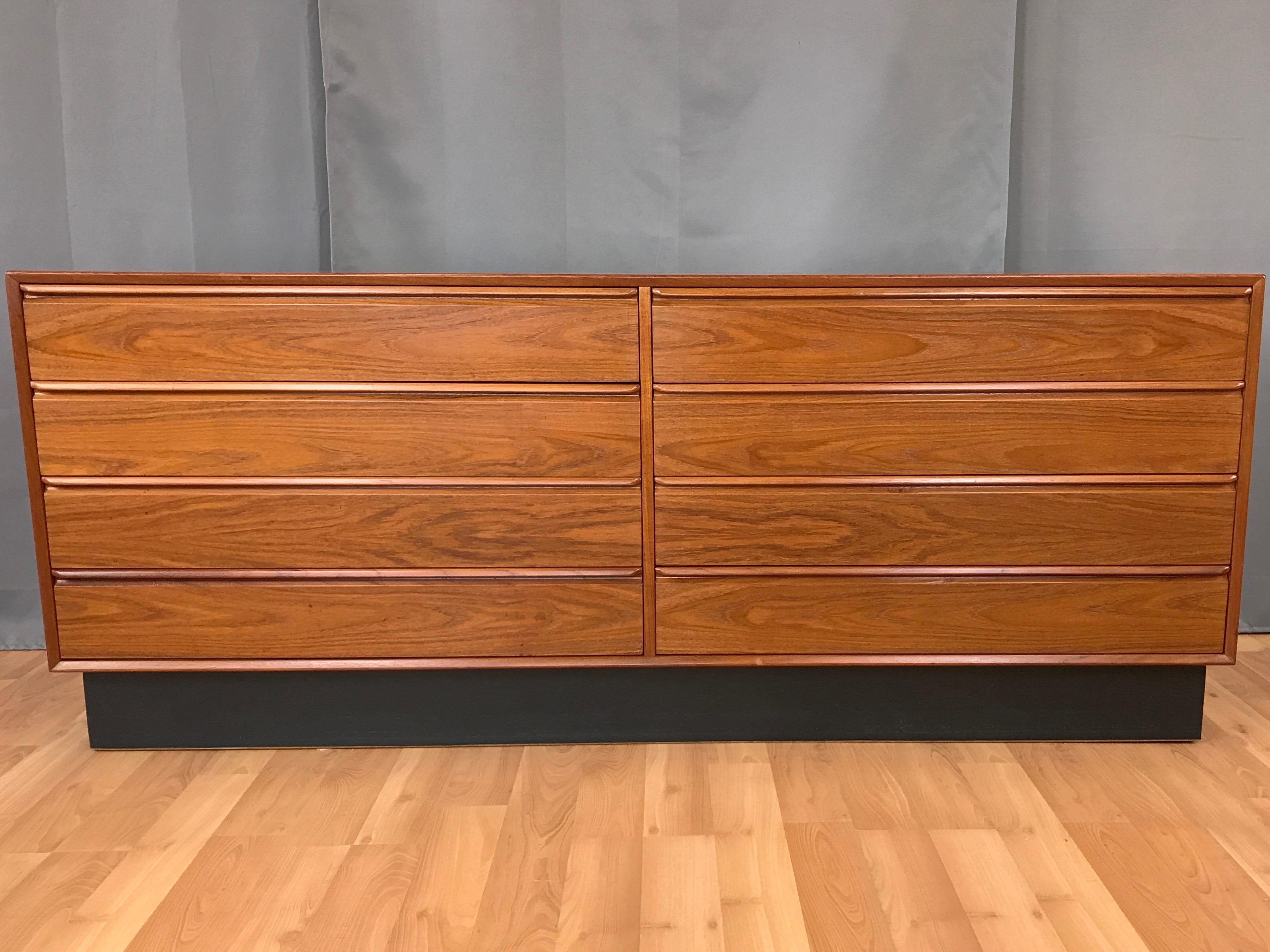 A fantastic and expansive 1960s teak eight-drawer dresser by Westnofa Furniture of Norway.

Clean Scandinavian Modern lines and excellent craftsmanship on display throughout. Notable for phenomenally figured grain-matched teak that’s in great