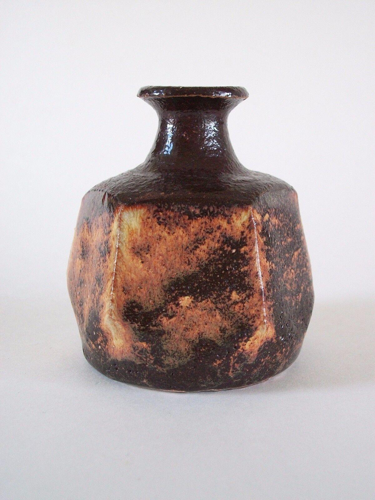 Vintage terracotta wheel thrown studio pottery bud vase with cut sides - thick gloss brown glaze over a white base - dramatic form - initialed on the base - Canada - mid 20th century.

Excellent vintage condition - no loss - no damage - no
