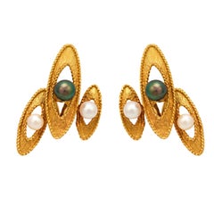 Orecchini a clip d'epoca in oro giallo 18k con perle bianche e nere