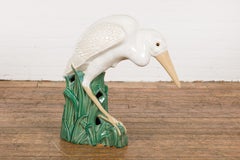 Scultura vintage in ceramica smaltata bianca e crema raffigurante un airone