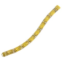 Zeitgenössisches Diamantarmband aus Weiß- und Gelbgold