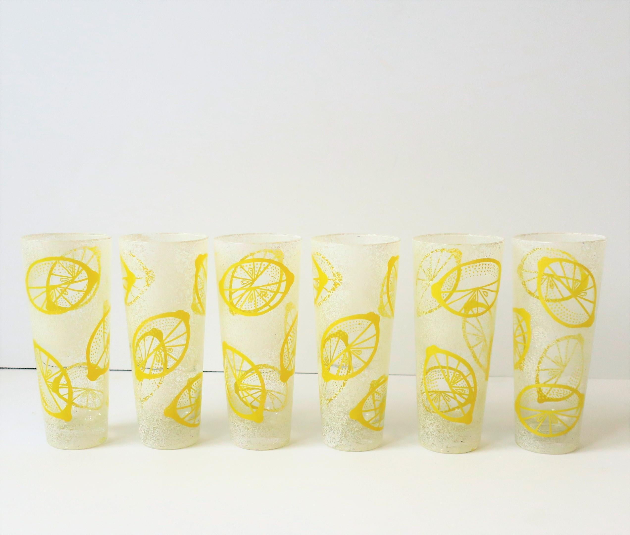 A beautiful set of 6 vintage yellow and white highball cocktail rocks' glasses with 'lemon' wedge design, circa Mid-20th century. This beautiful set has a slightly raised/textured design. Great for cocktails, lemonade, etc., for summer, yachting,