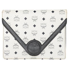 Pochette vintage blanche et noire avec monogramme MCM