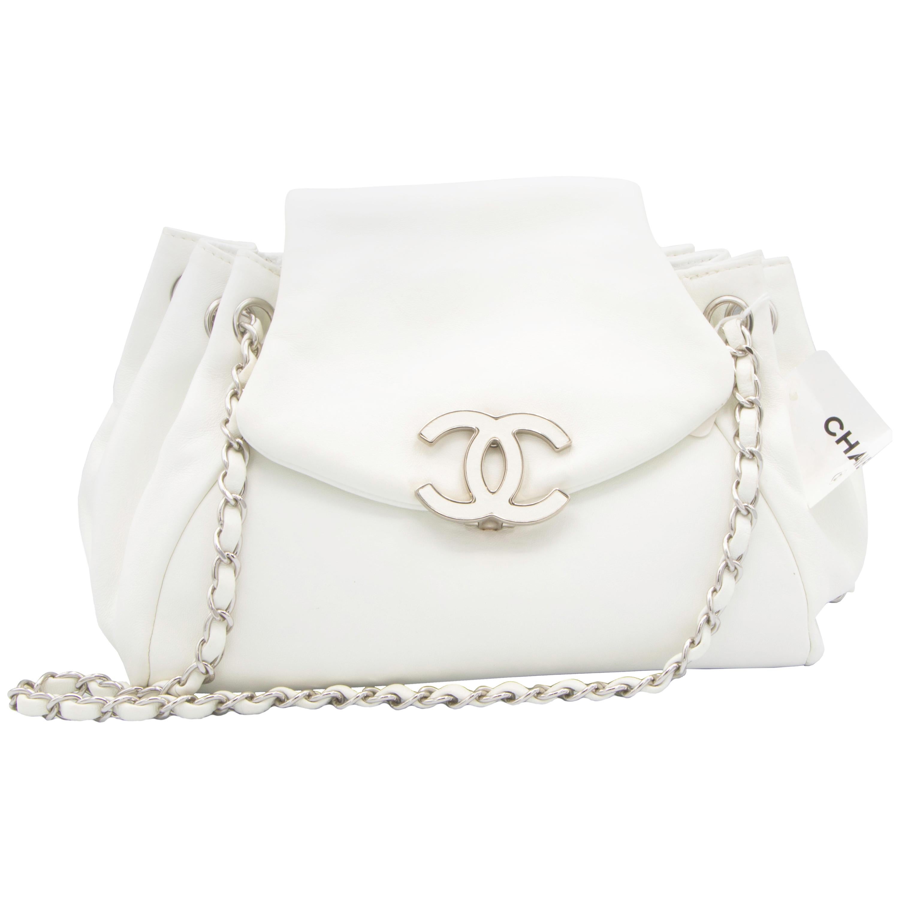 Vintage White Chanel Handbag with Matching Leather and Silver-Colored Strap