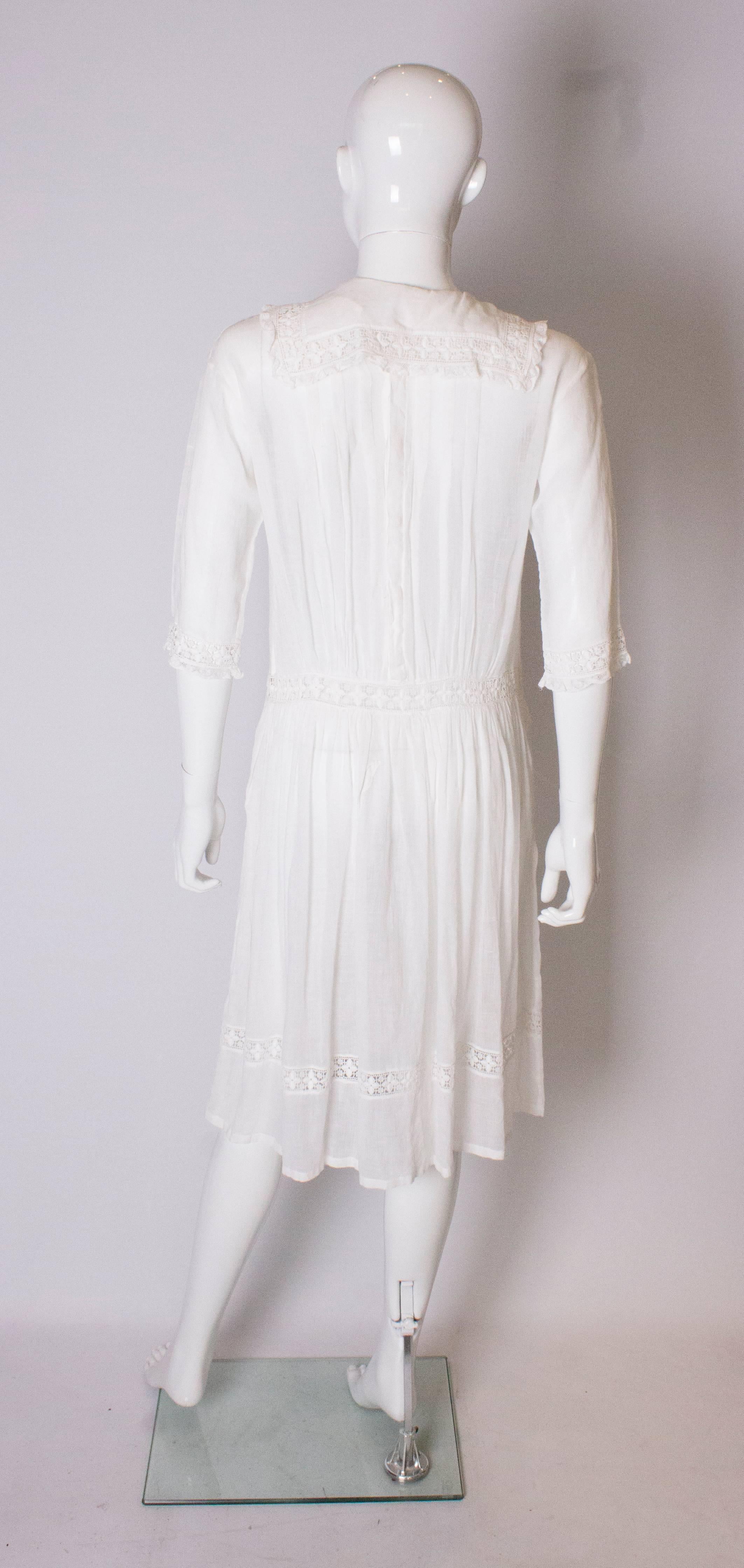 A Vintage edwardian lawn cotton dress with delicate embroidered flowers  1