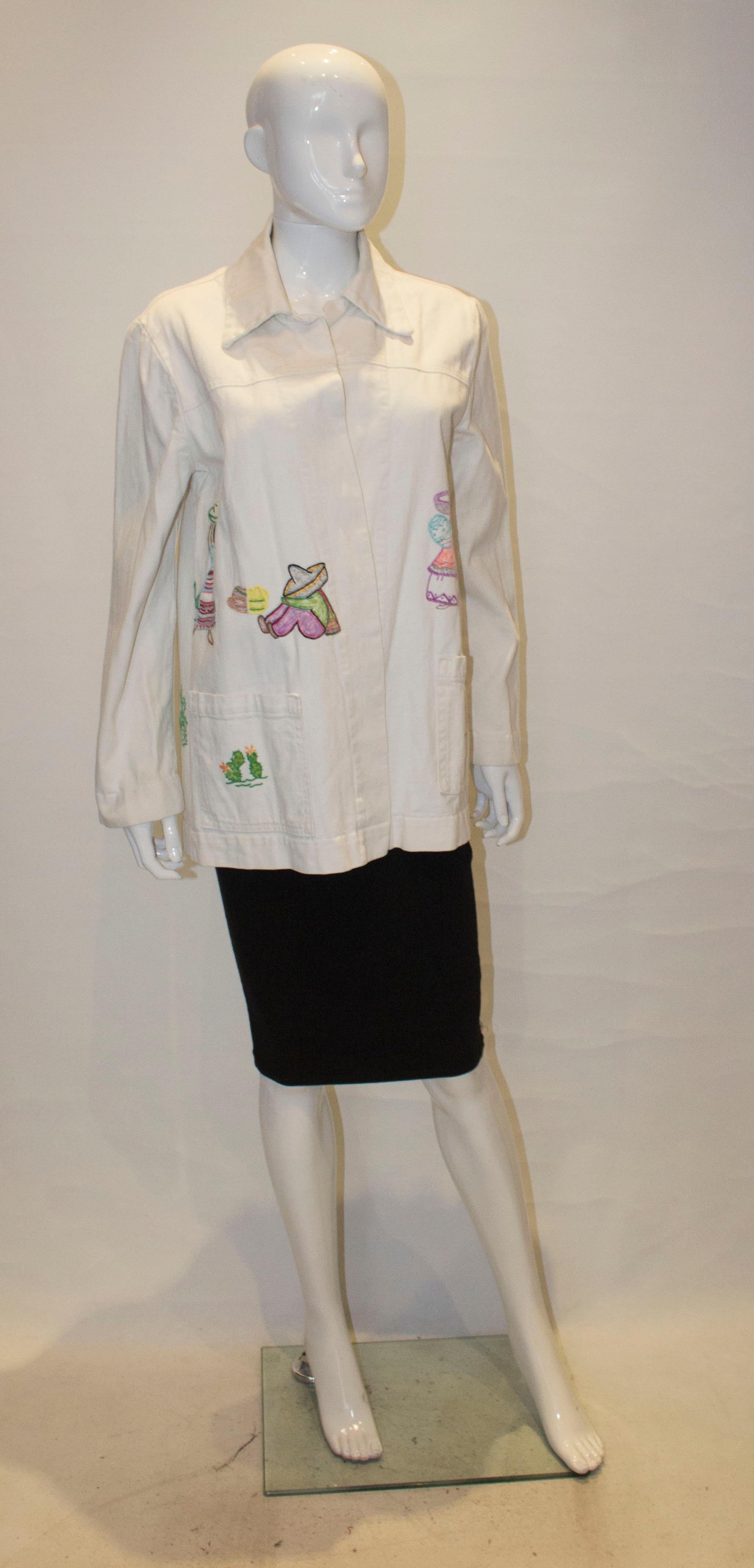 A fun jacket for Spring, in a heavy white cotton with embroidery detail on the front and back. The jacket is loose fitting , and will fit bust up to 40'' and has two pockets at the front.