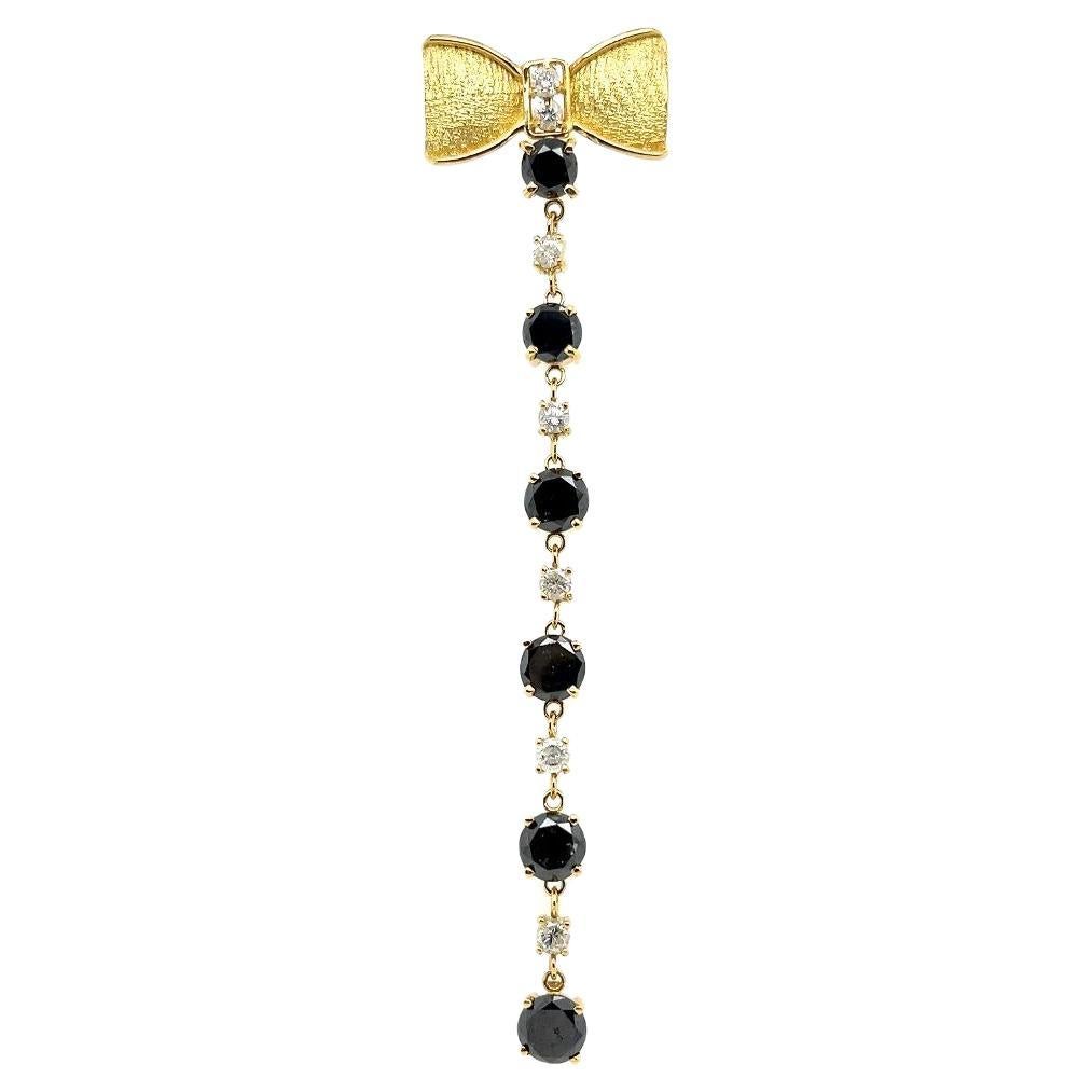 Vintage White Diamond and Black Diamond Gold Bow Slide Drop Pendant For Sale