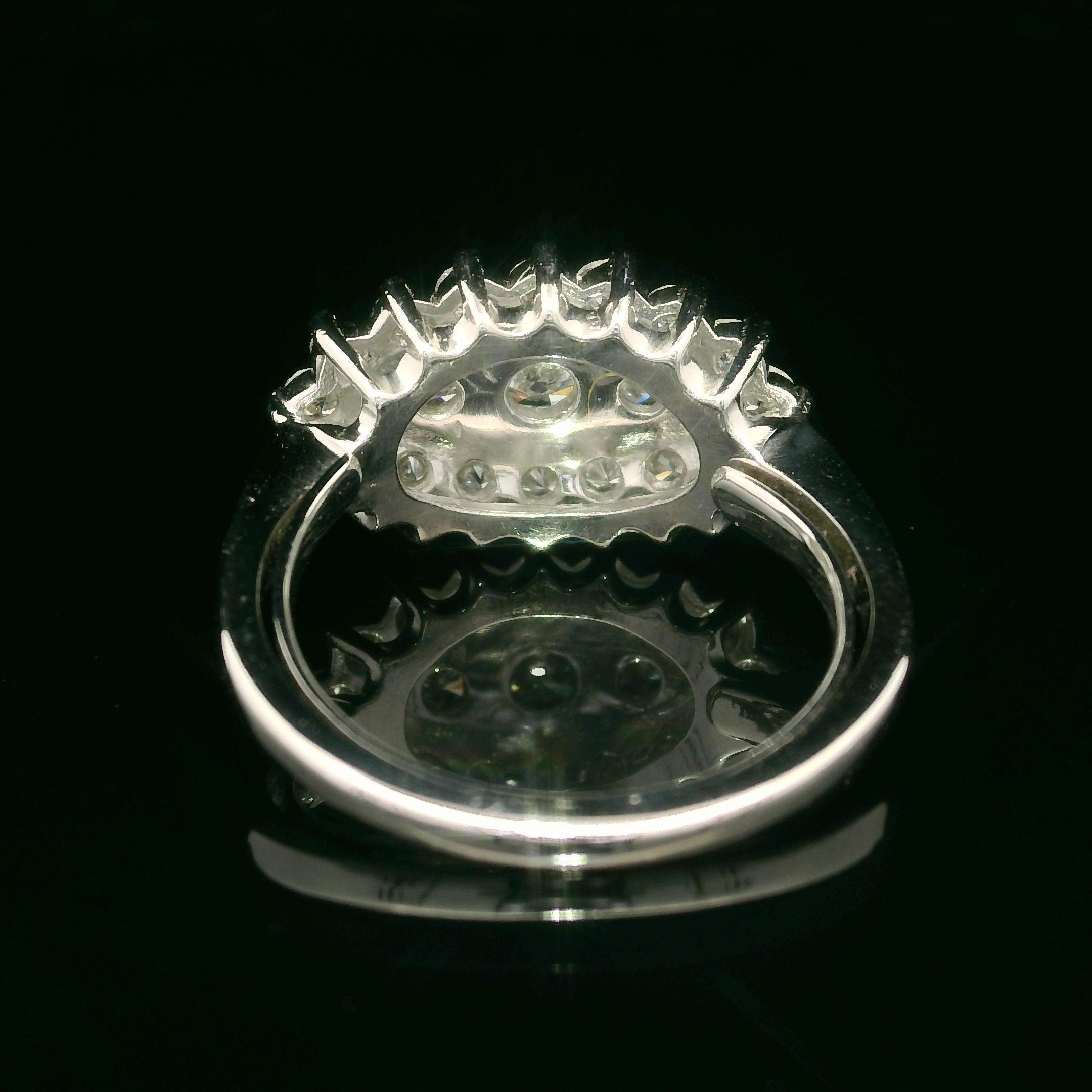 --Stone(s):--
(19) Natural Genuine Diamonds - Round Brilliant Cut - Prong Set - G/H Color - VS2/SI1 Clarity - 1.0ctw (approx.)
Total Carat Weight: 1.0 (approx.)

Material: Solid 14K White Gold
Weight: 4.55 Grams
Ring Size: 6.5 (Fitted on a finger.