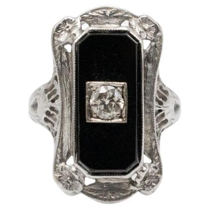 Weißgoldener Art-déco-Ring mit Diamanten und Onyx, 1930er Jahre.