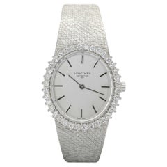 Montre cocktail Longines vintage en or blanc et diamants pour femmes