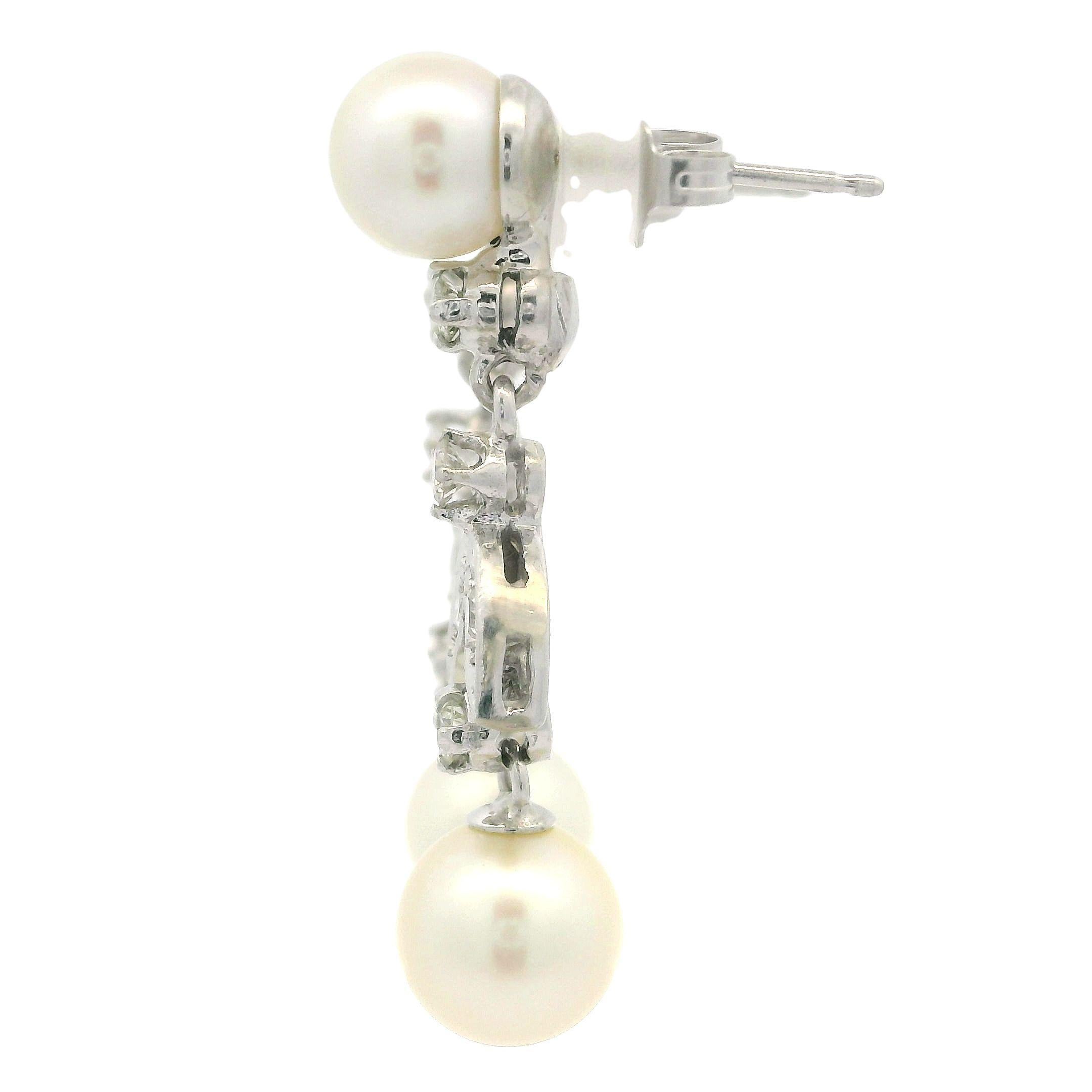 Orecchini pendenti con perle in oro bianco e diamanti da .38ctw con foglie di fiori di tulipano in vendita 4