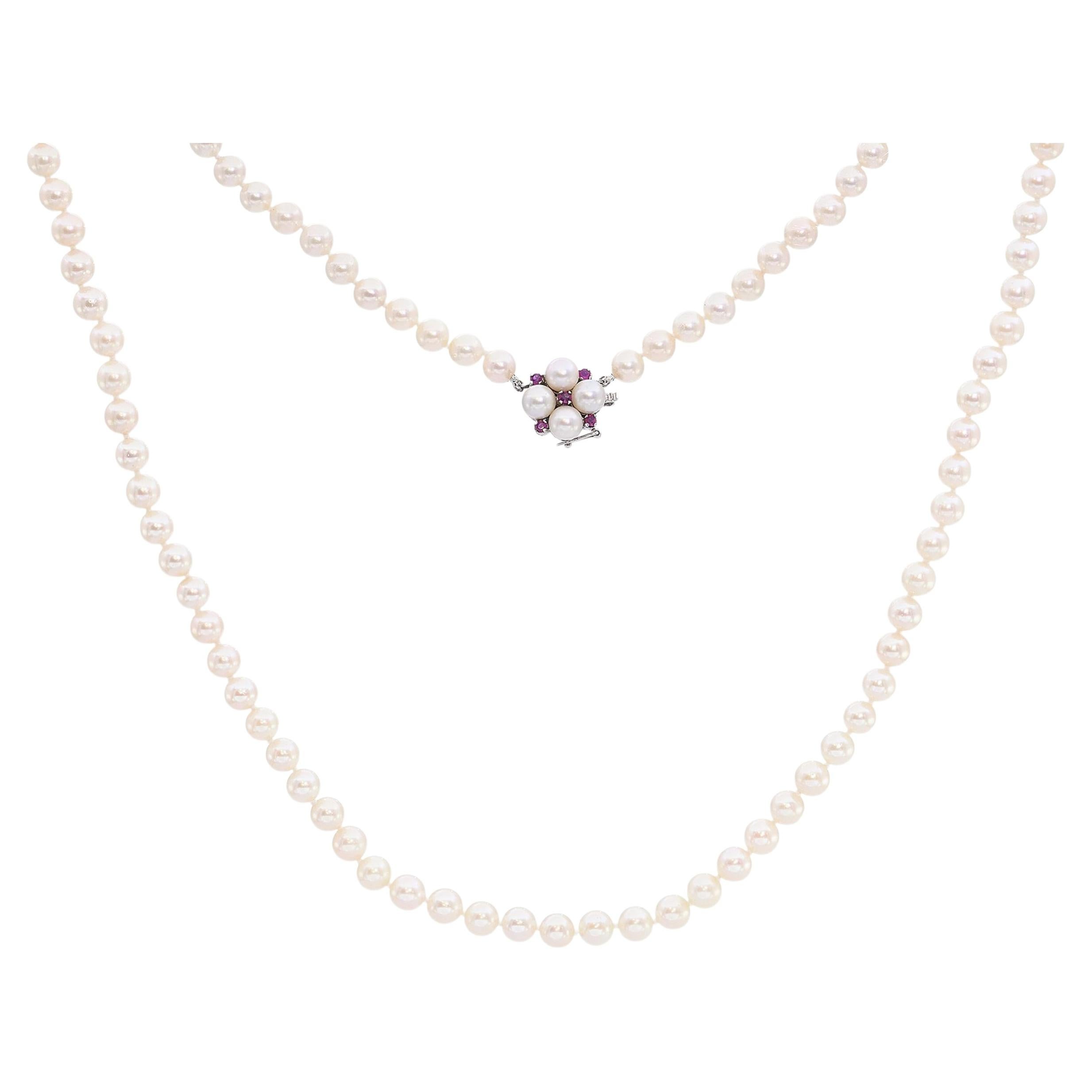 Collana vintage in oro bianco con zaffiri rosa e perle a filo