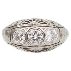 Vintage White Gold Three-Stone Diamond Filigree Engagement Ring, circa 1930s